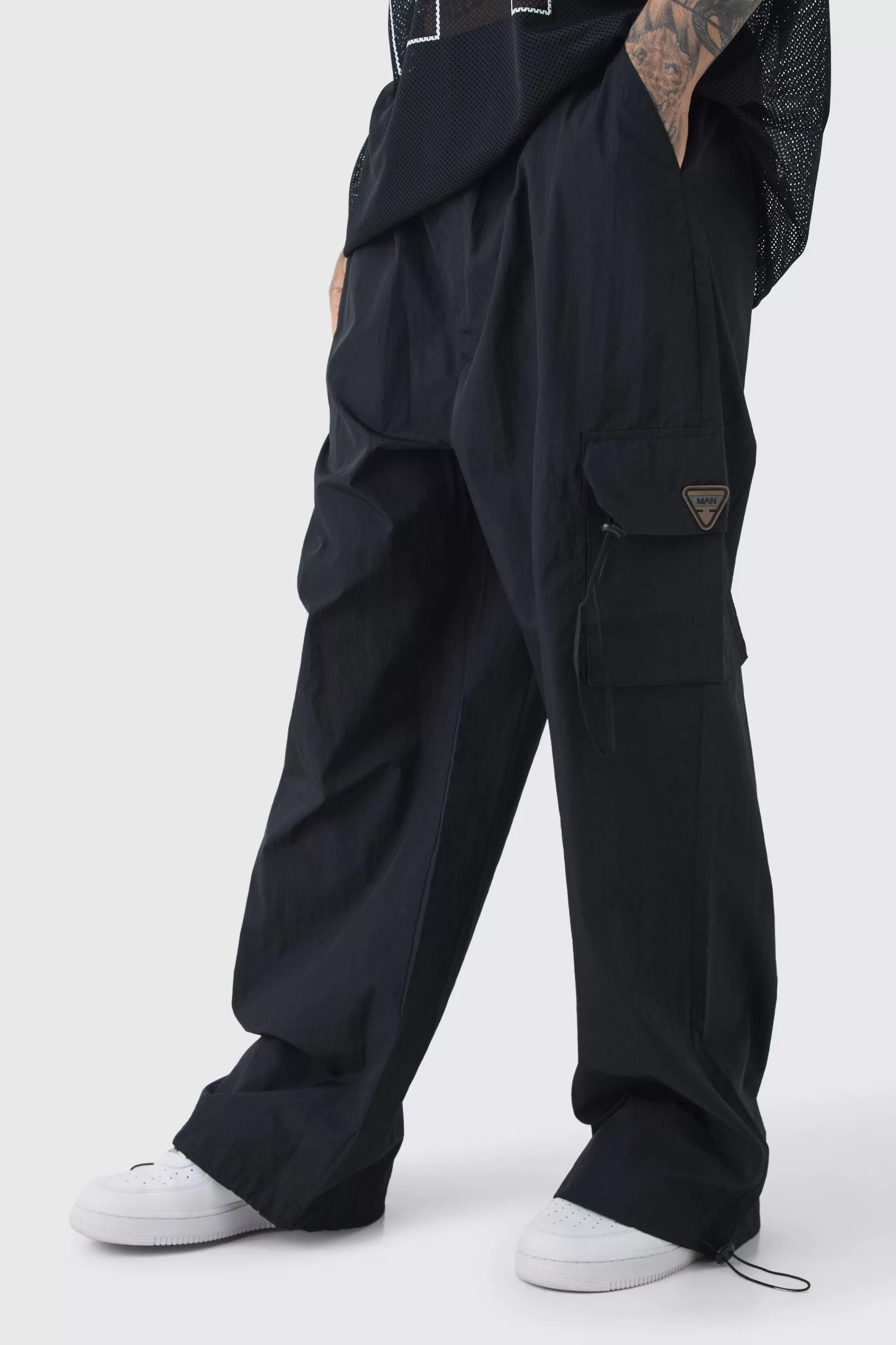 boohooMAN Tall Crinkle Nylon Cargo Parachute Trousers In | UK
