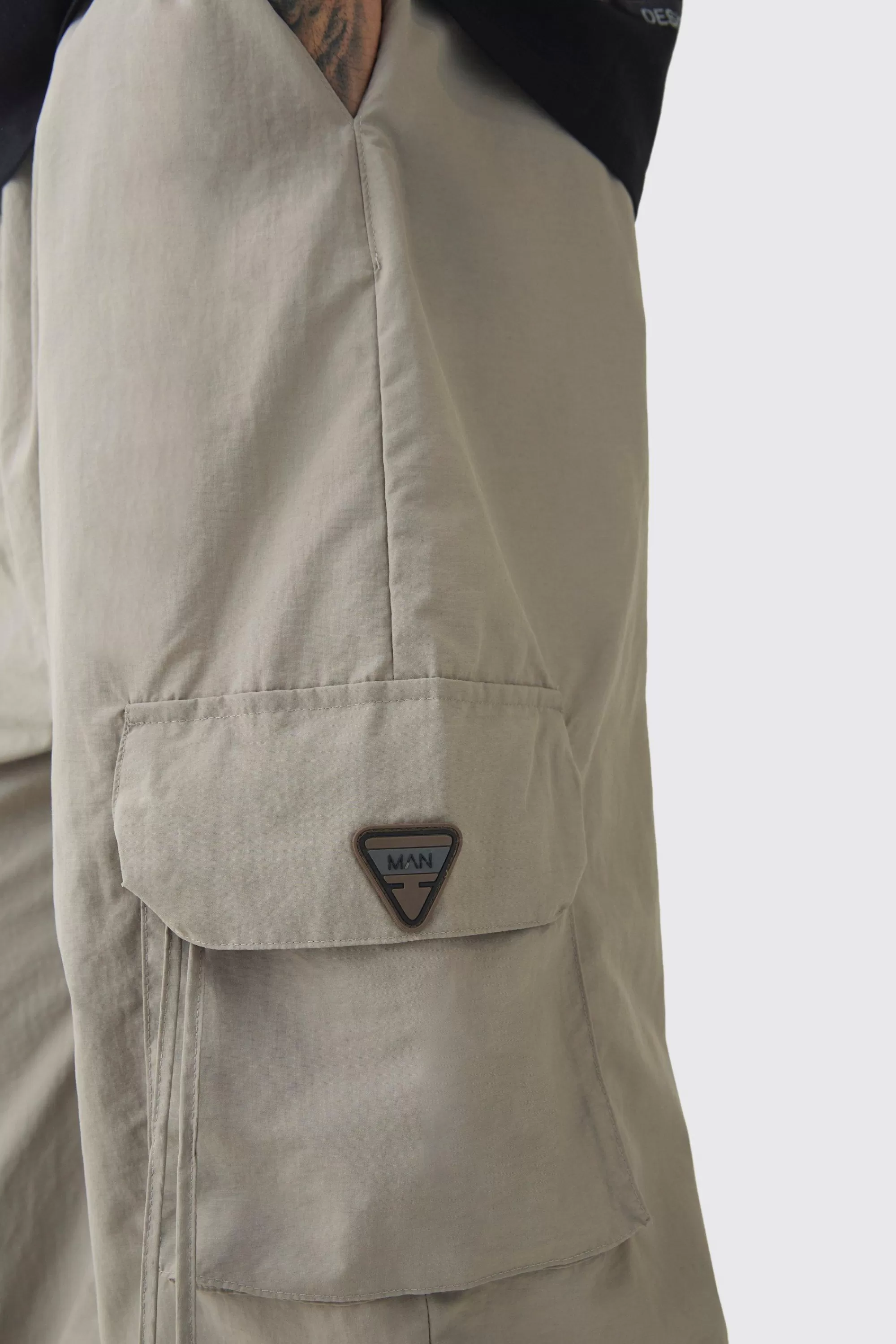boohooMAN Tall Crinkle Nylon Cargo Parachute Trousers In | UK