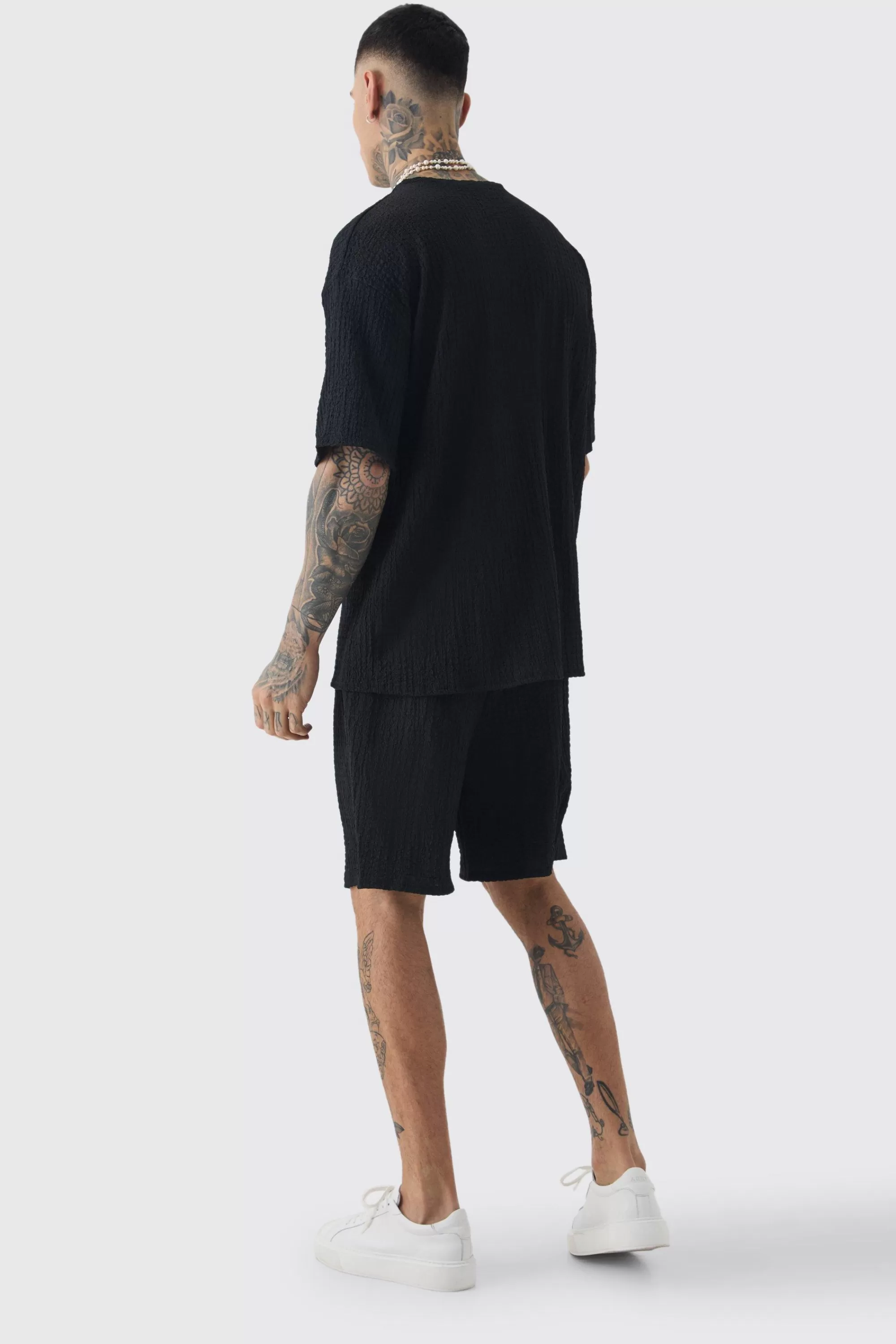 boohooMAN Tall Crinkle Textured T-Shirt & Short Set | UK