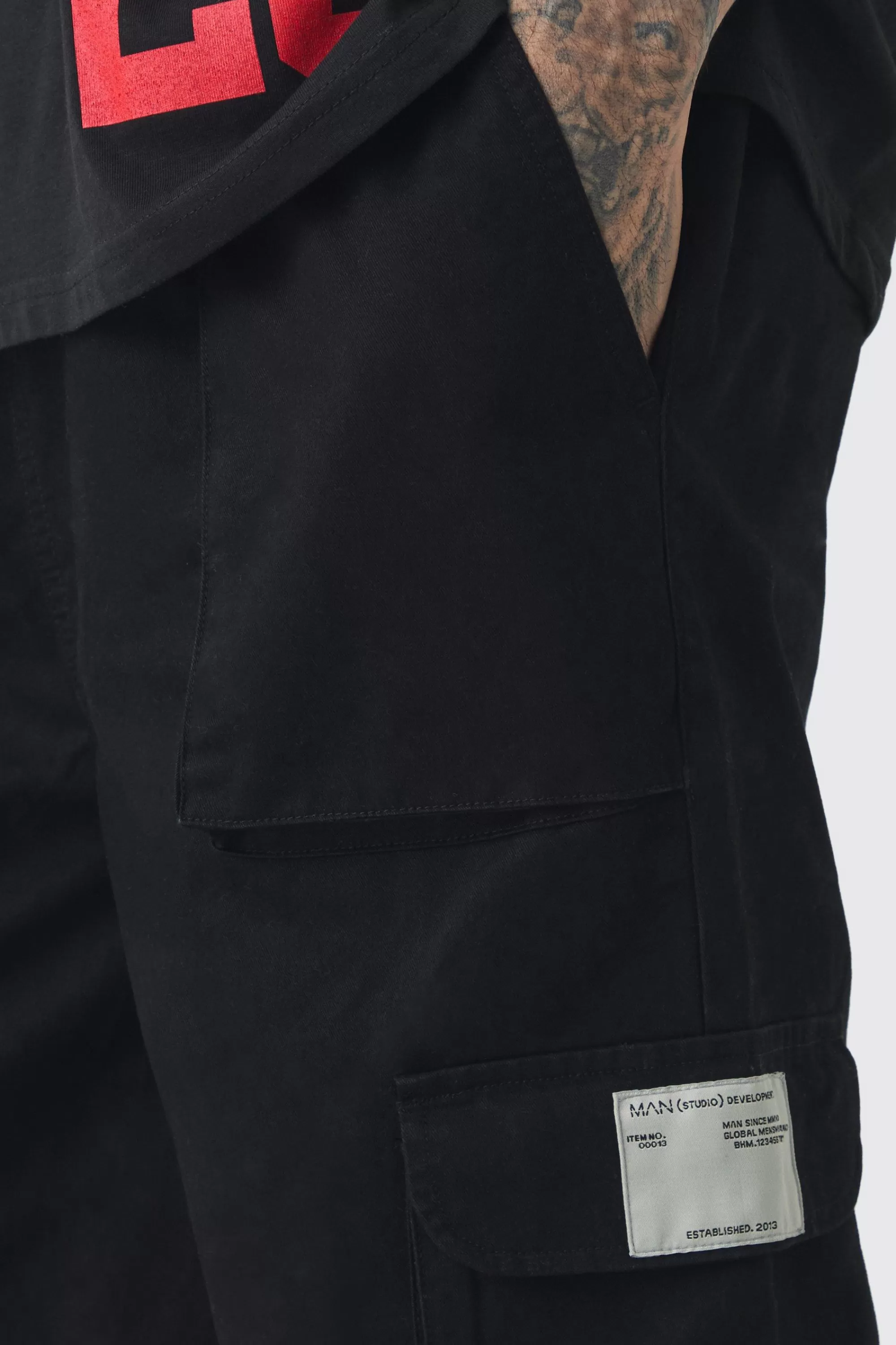 boohooMAN Tall Cuffed Hem Woven Tab Cargo Trousers In | UK