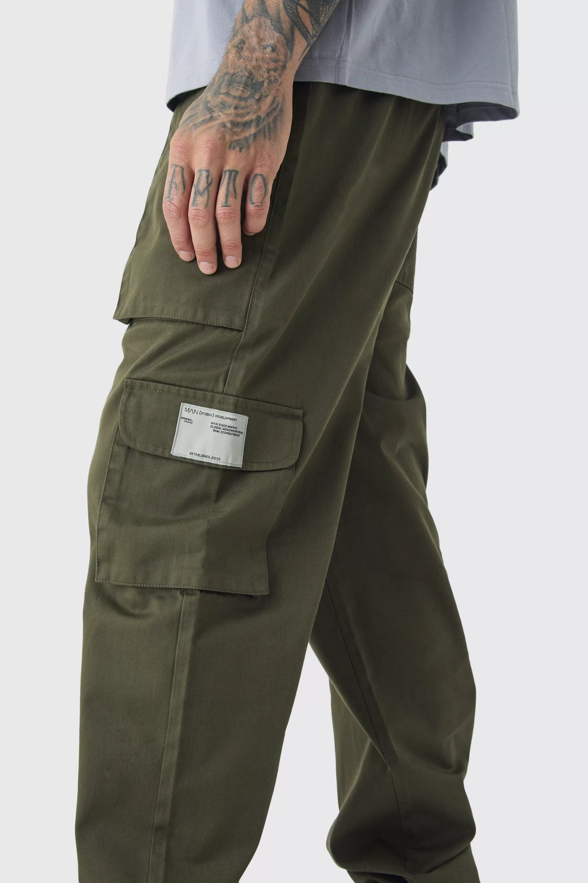 boohooMAN Tall Cuffed Hem Woven Tab Cargo Trousers In | UK