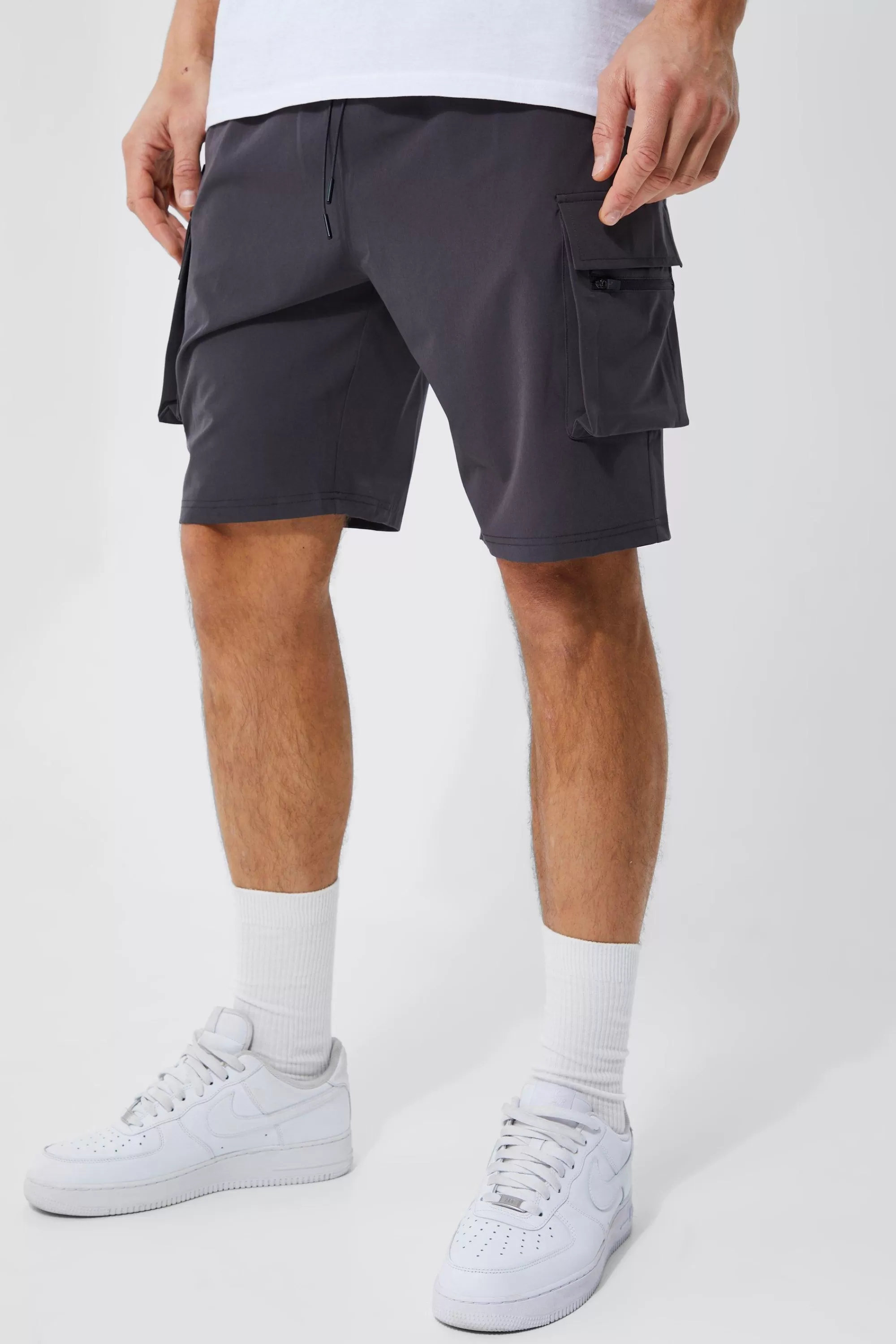 boohooMAN Tall Elastic Waist 4 Way Stretch Cargo Short | UK