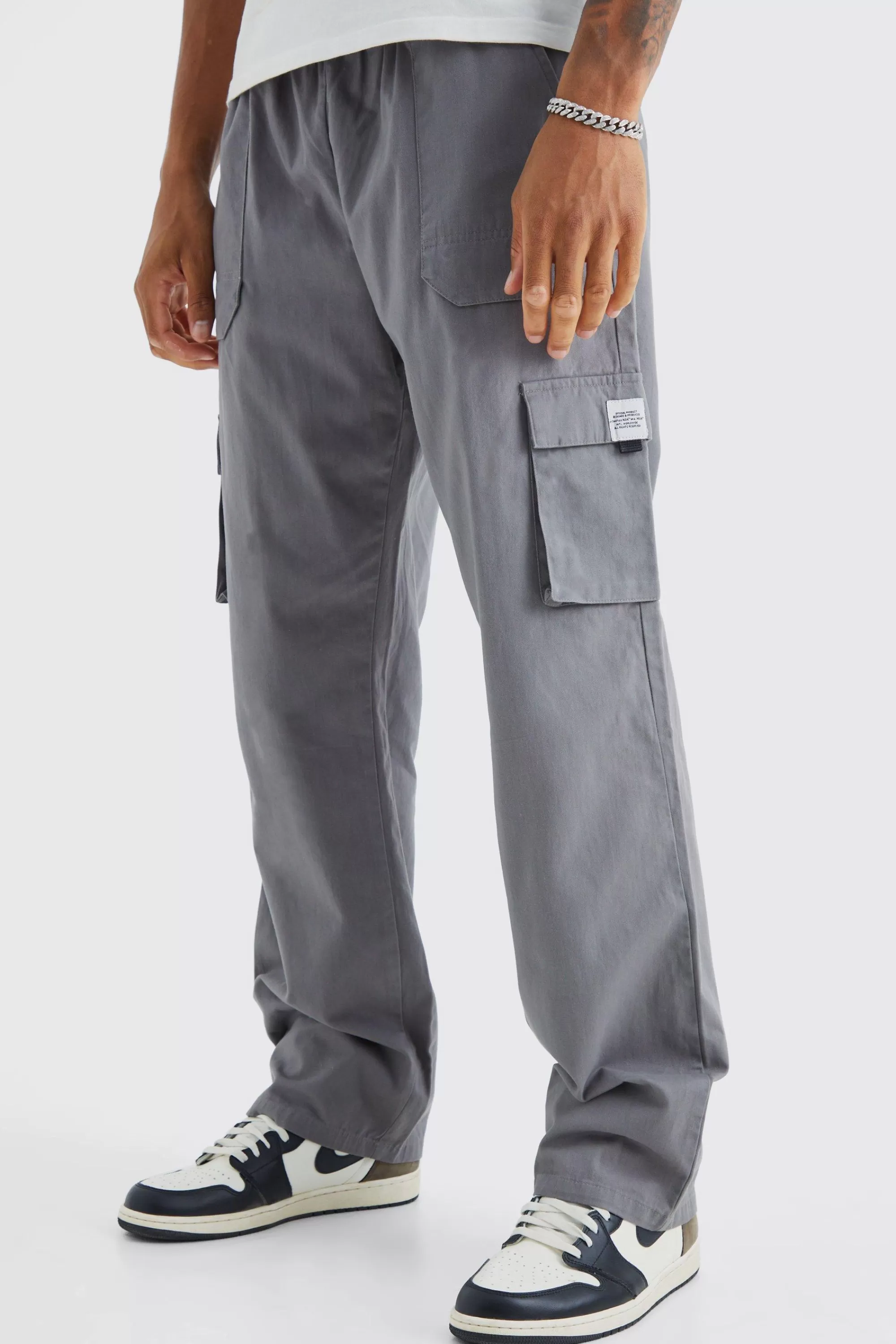 boohooMAN Tall Elastic Waist Relaxed Fit Buckle Cargo Jogger | UK