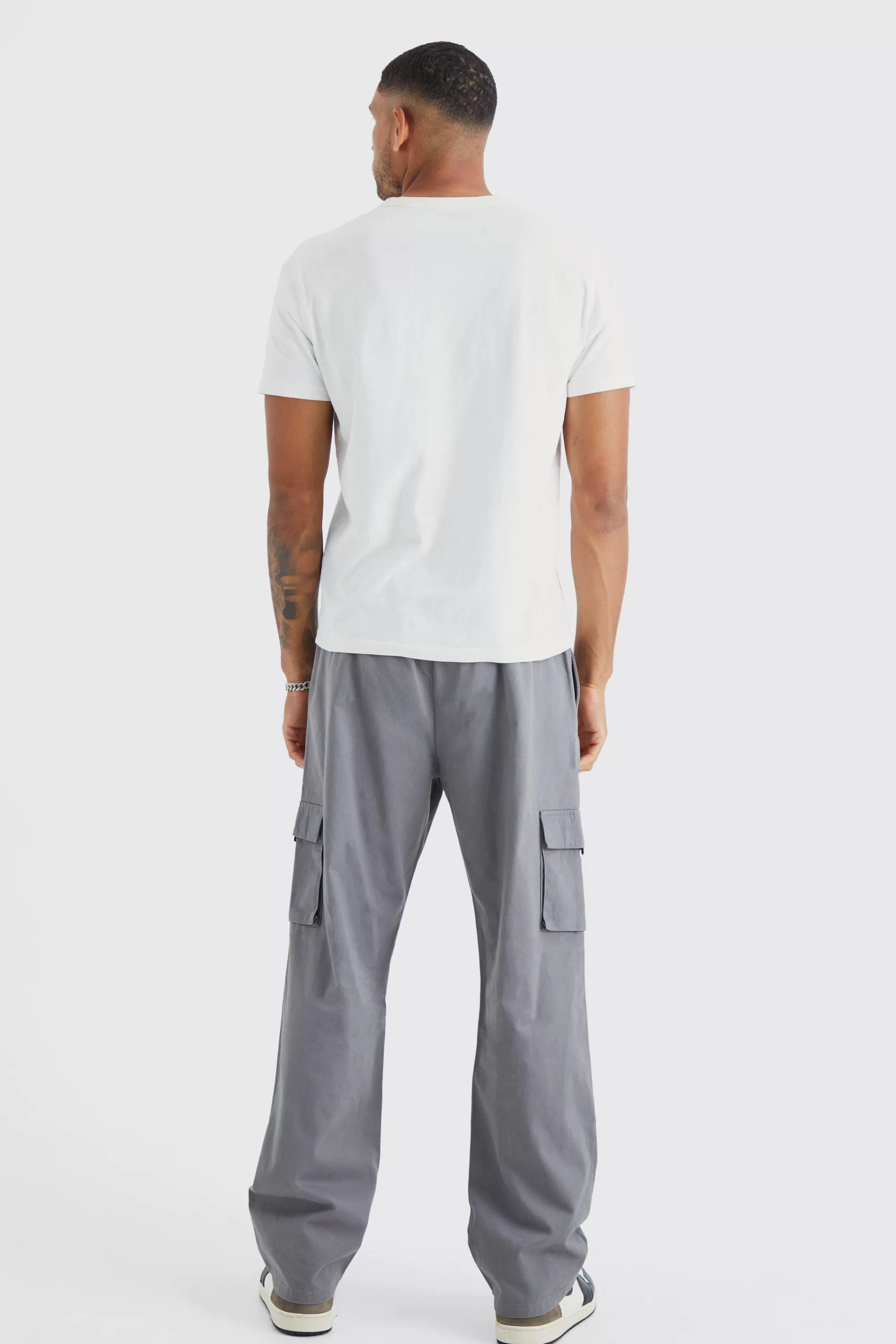 boohooMAN Tall Elastic Waist Relaxed Fit Buckle Cargo Jogger | UK