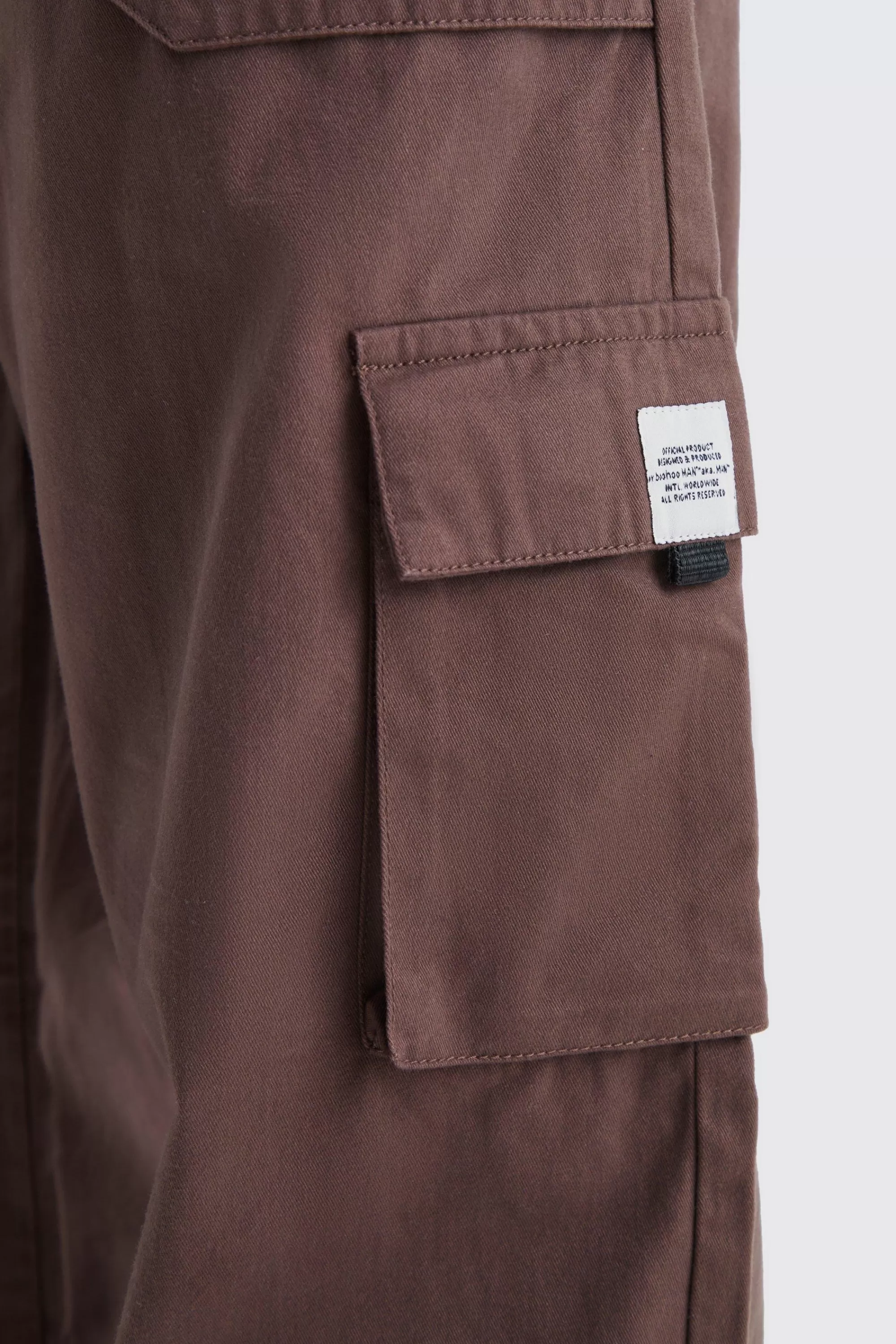 boohooMAN Tall Elastic Waist Relaxed Fit Buckle Cargo Jogger | UK