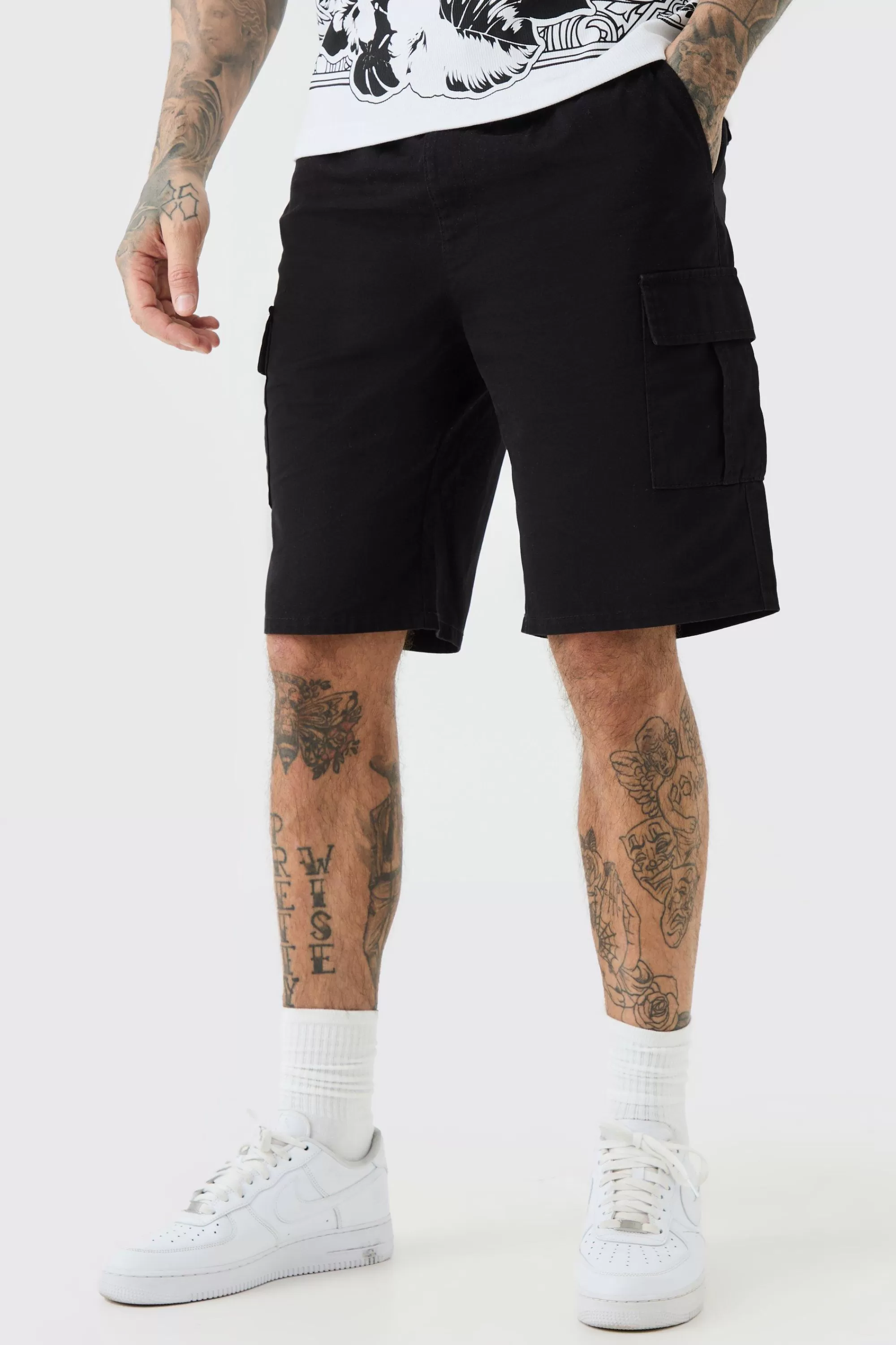 boohooMAN Tall Elastic Waist Relaxed Fit Cargo Shorts In | UK