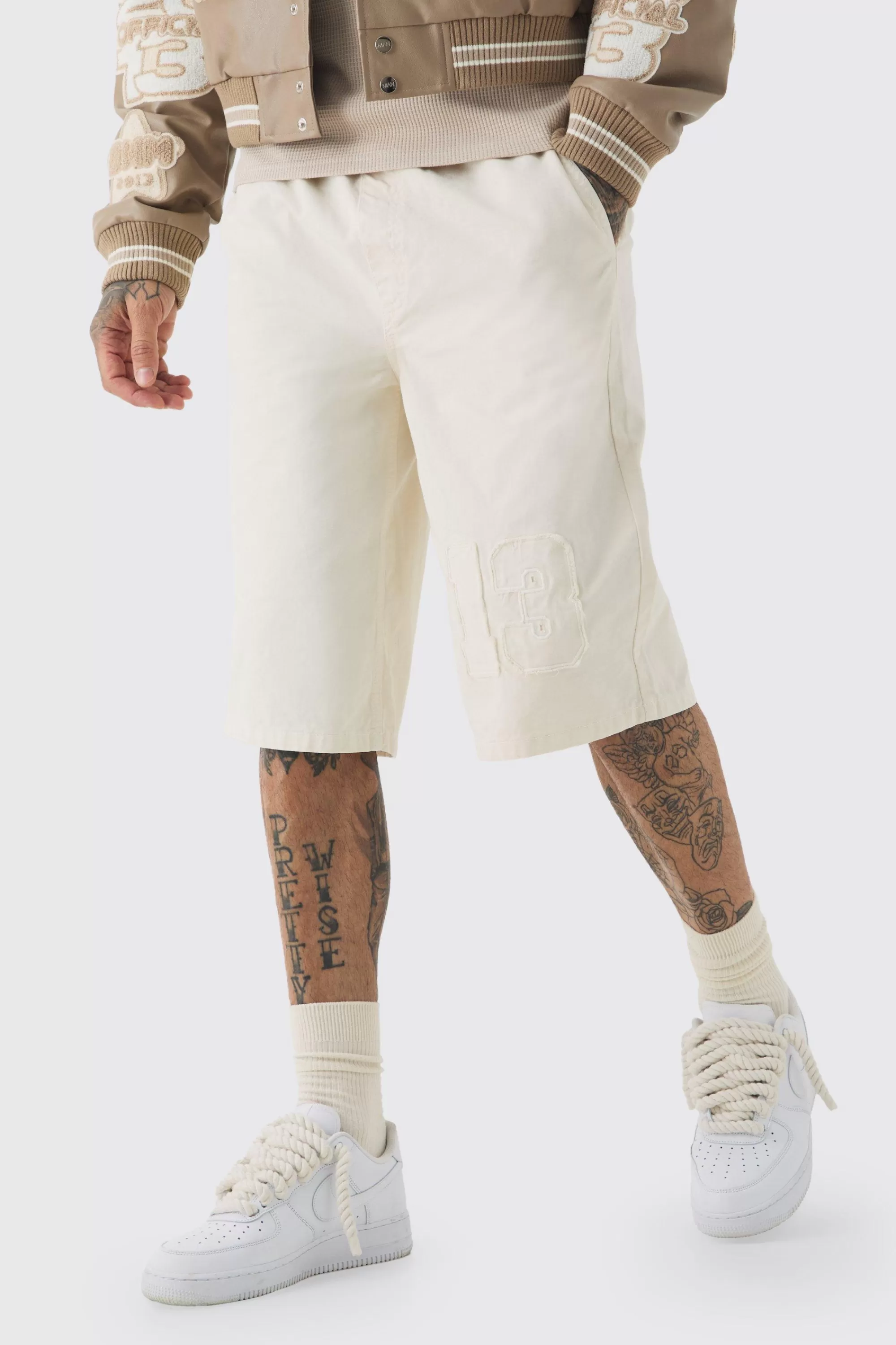 boohooMAN Tall Elasticated Waist Applique Jorts | UK