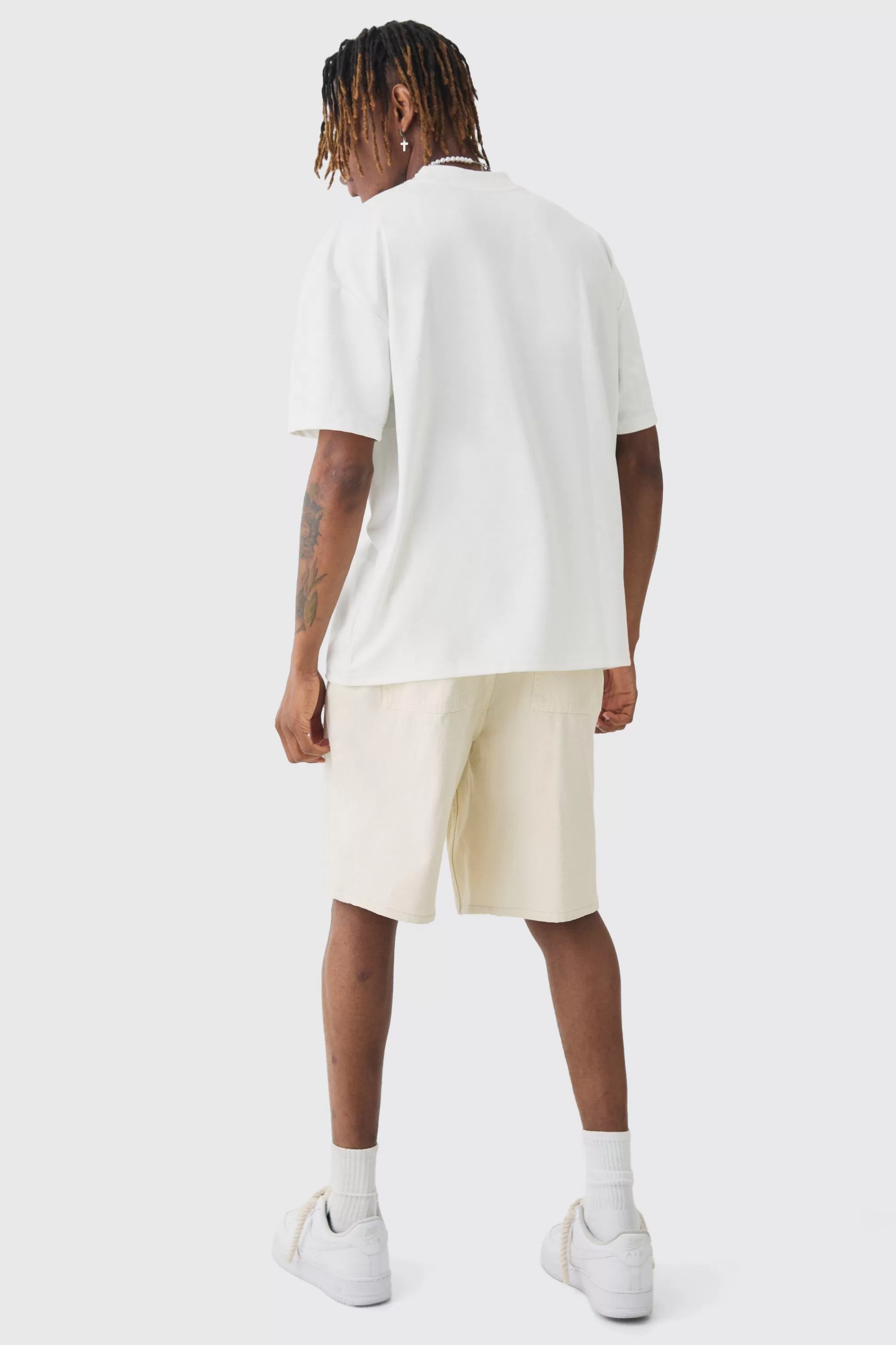 boohooMAN Tall Elasticated Waist Drawcord Detail Slim Fit Shorts In | UK