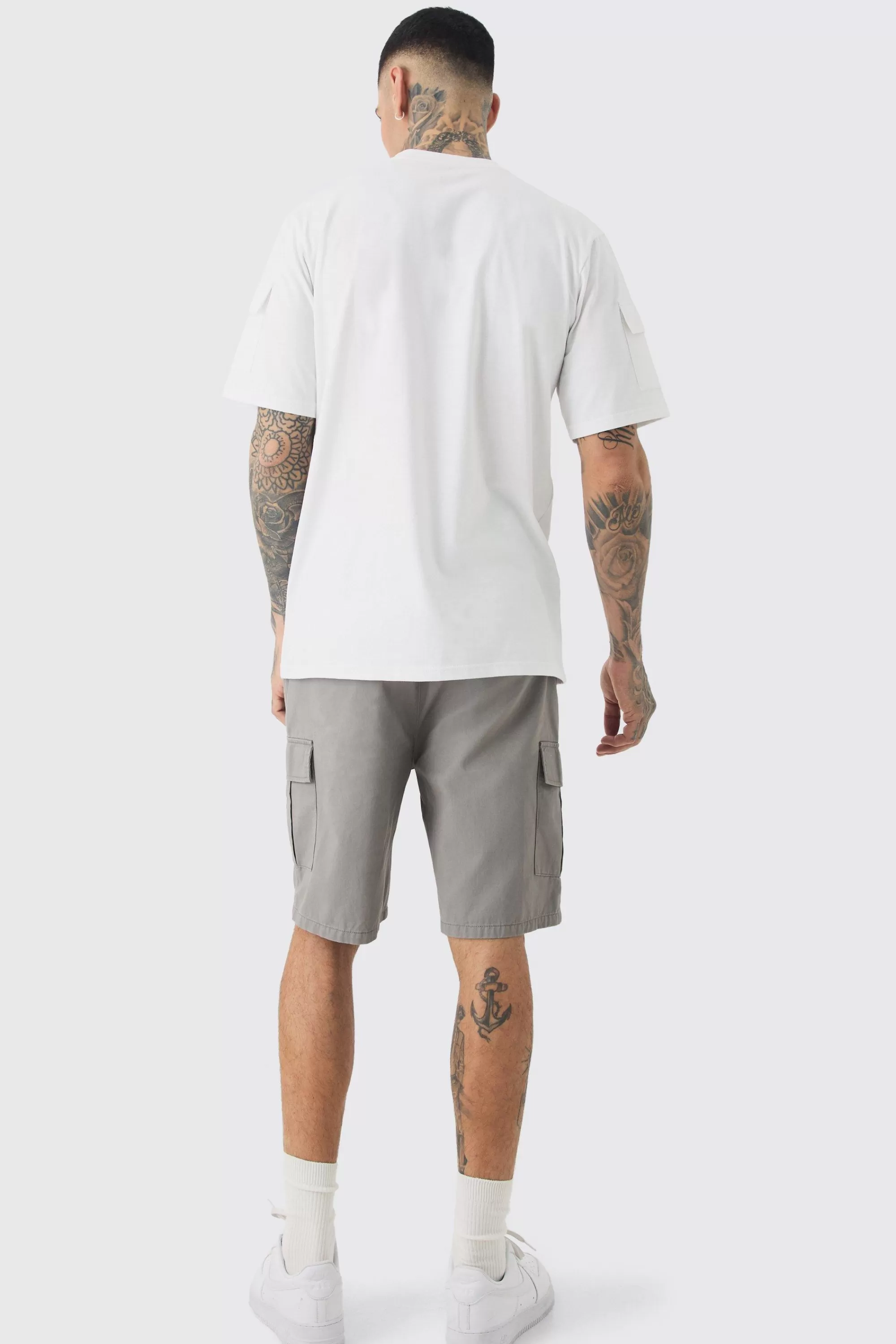 boohooMAN Tall Elasticated Waist Relaxed Fit Cargo Shorts | UK