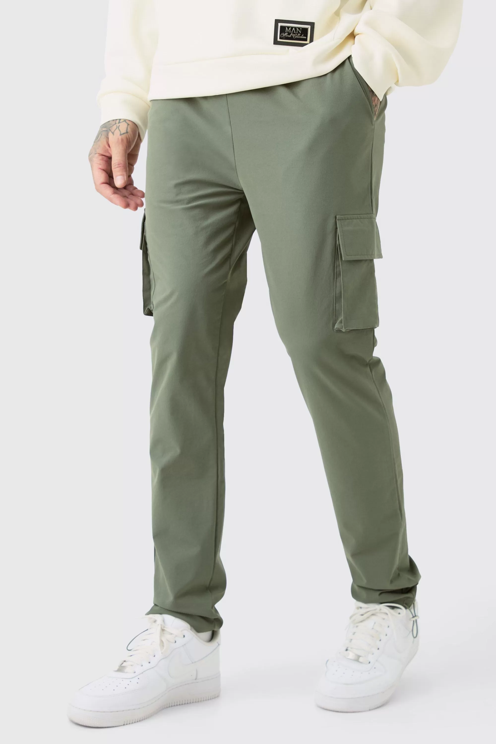 boohooMAN Tall Elasticated Waist Lightweight Stretch Skinny Cargo Trouser | UK
