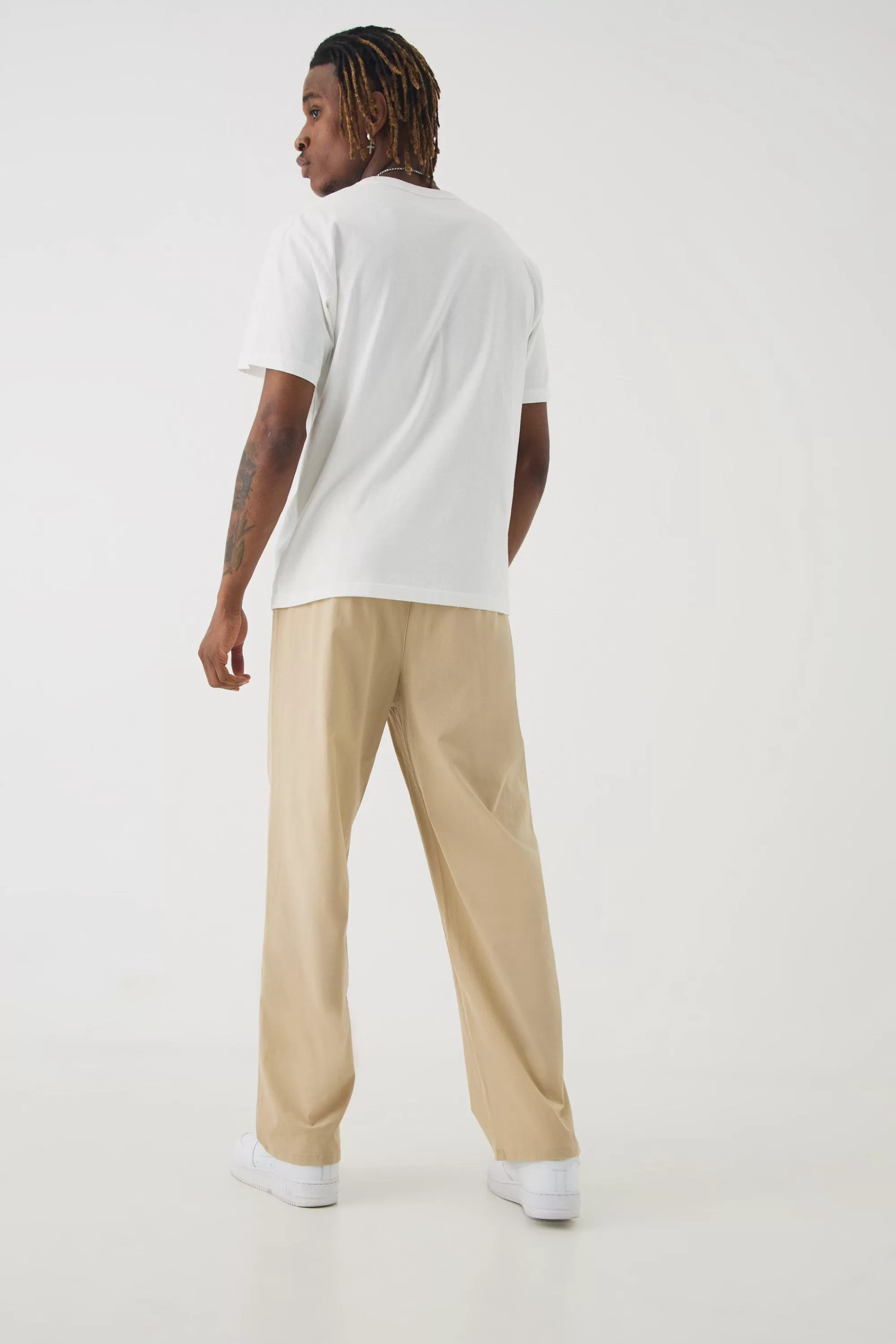 boohooMAN Tall Elasticated Waist Lightweight Technical Stretch Relaxed Cropped Trouser | UK