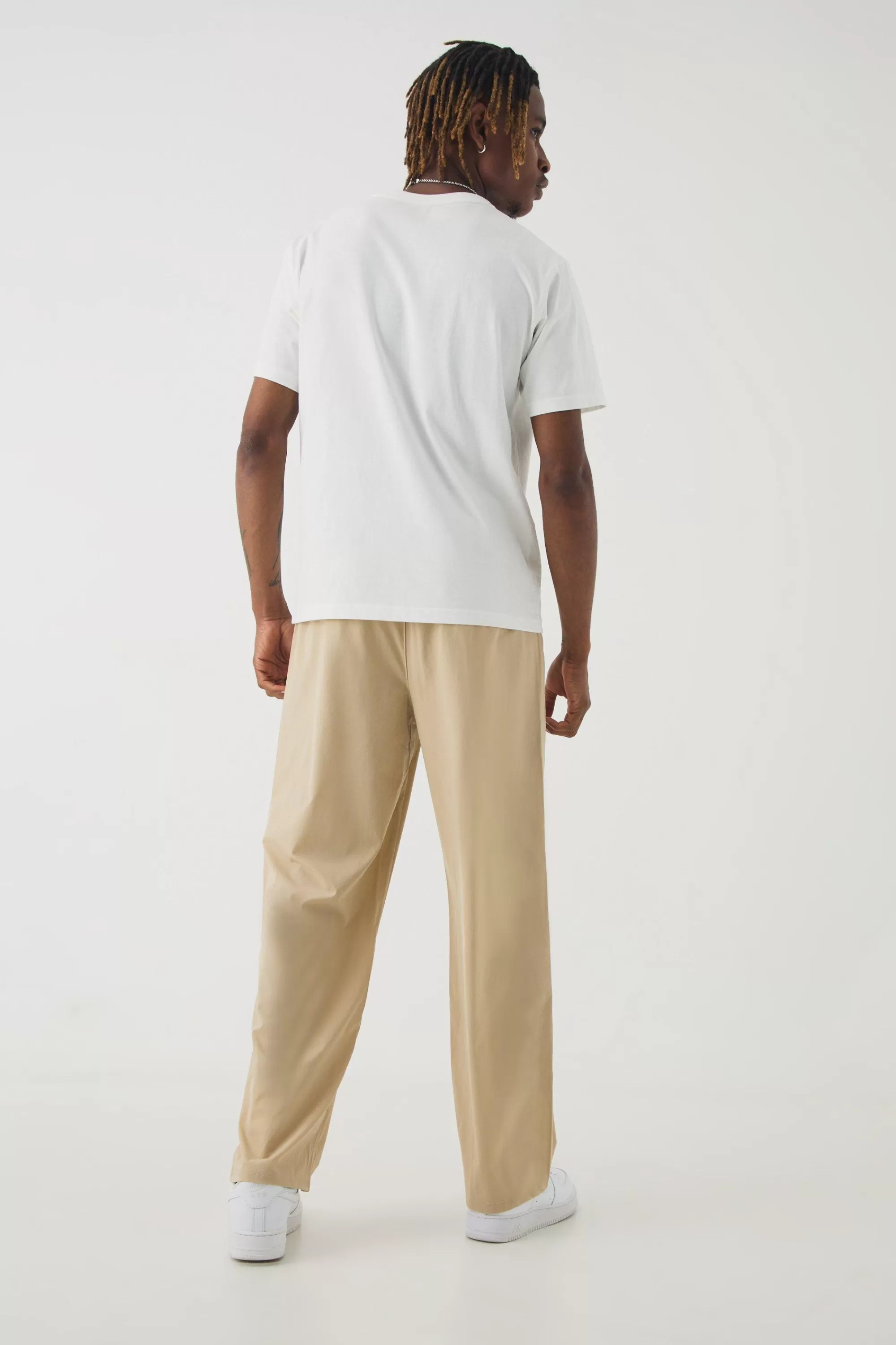 boohooMAN Tall Elasticated Waist Lightweight Technical Stretch Relaxed Cropped Trouser | UK