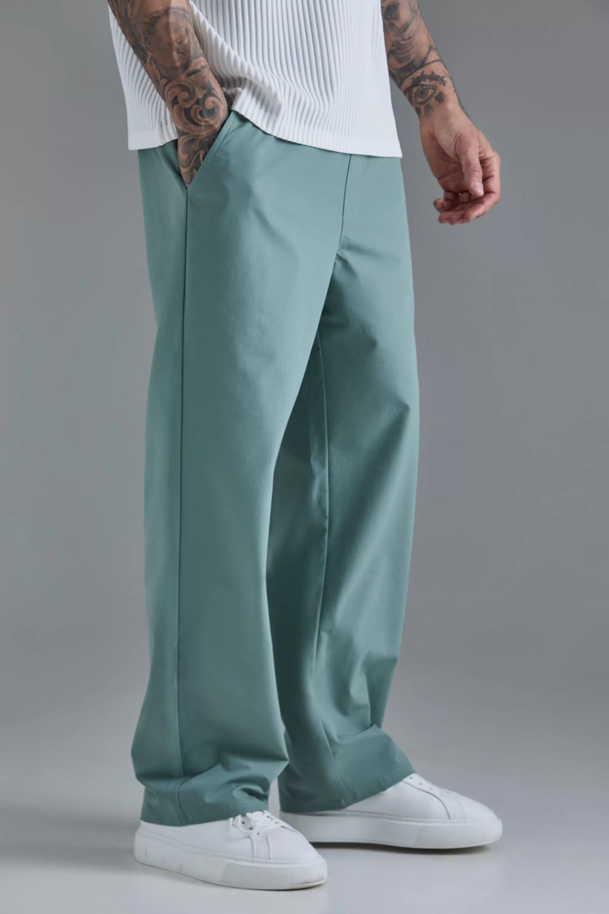 boohooMAN Tall Elasticated Waist Lightweight Technical Stretch Relaxed Trouser | UK