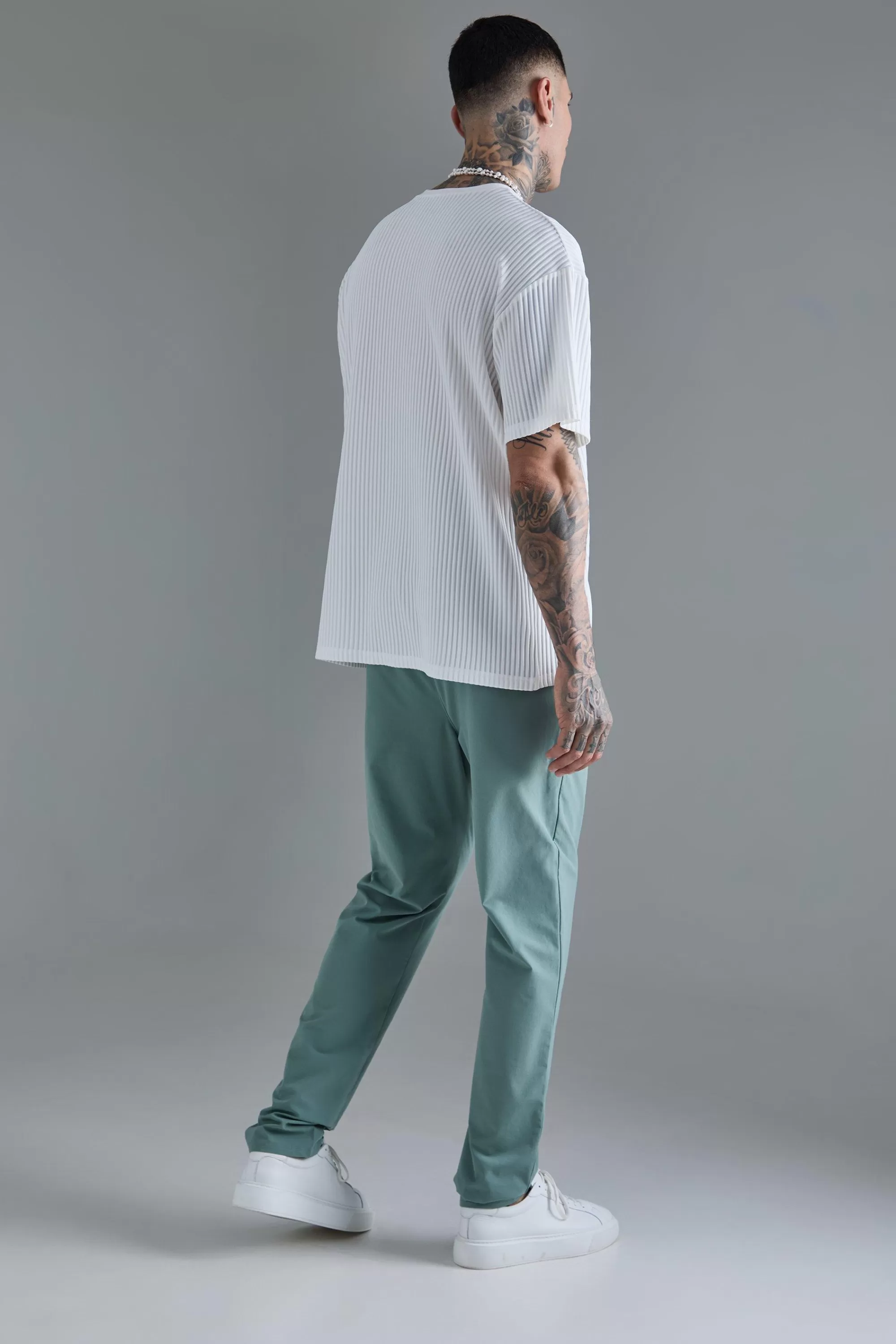 boohooMAN Tall Elasticated Waist Lightweight Technical Stretch Slim Trouser | UK