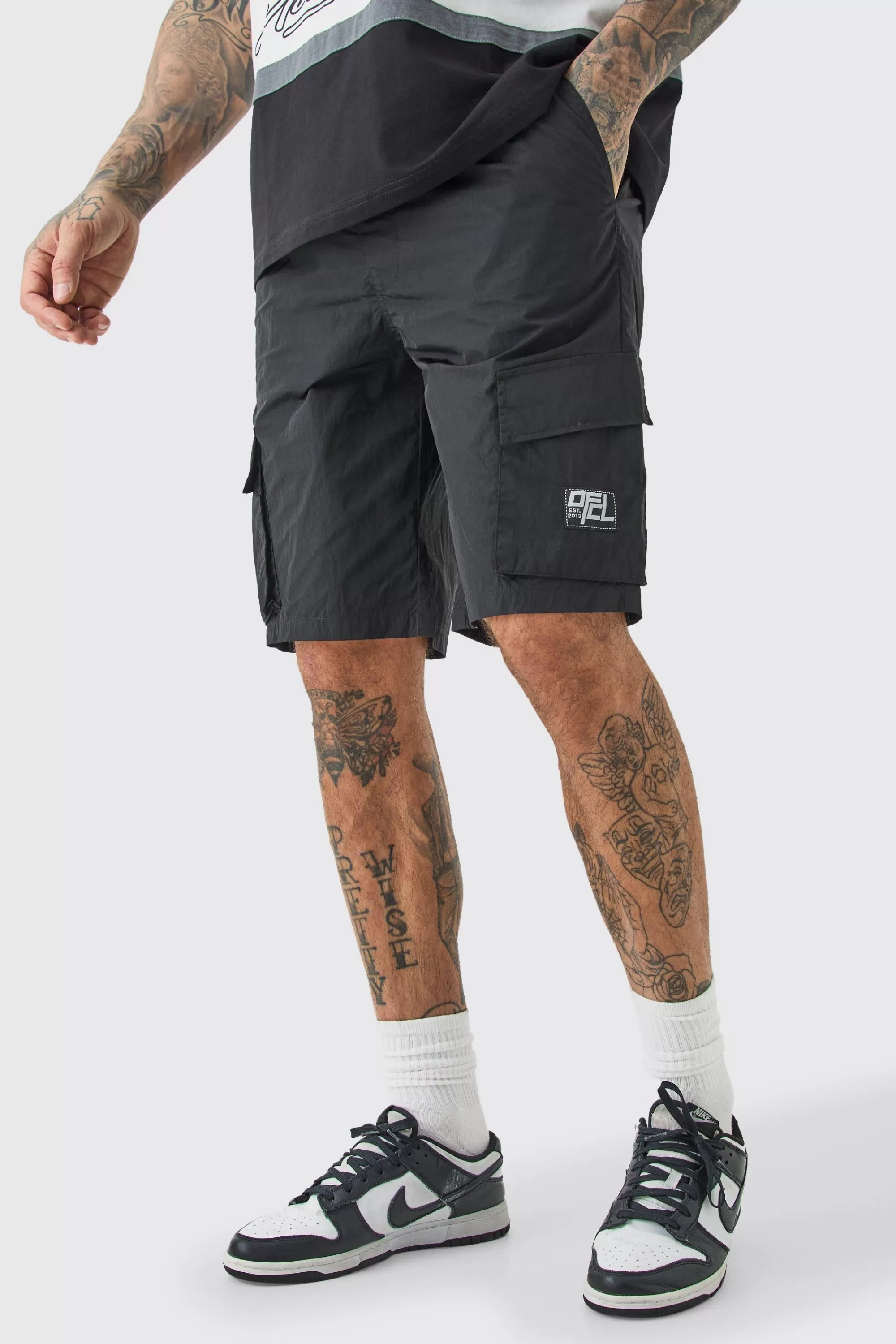 boohooMAN Tall Elasticated Waist Ofcl Nylon Cargo Short | UK