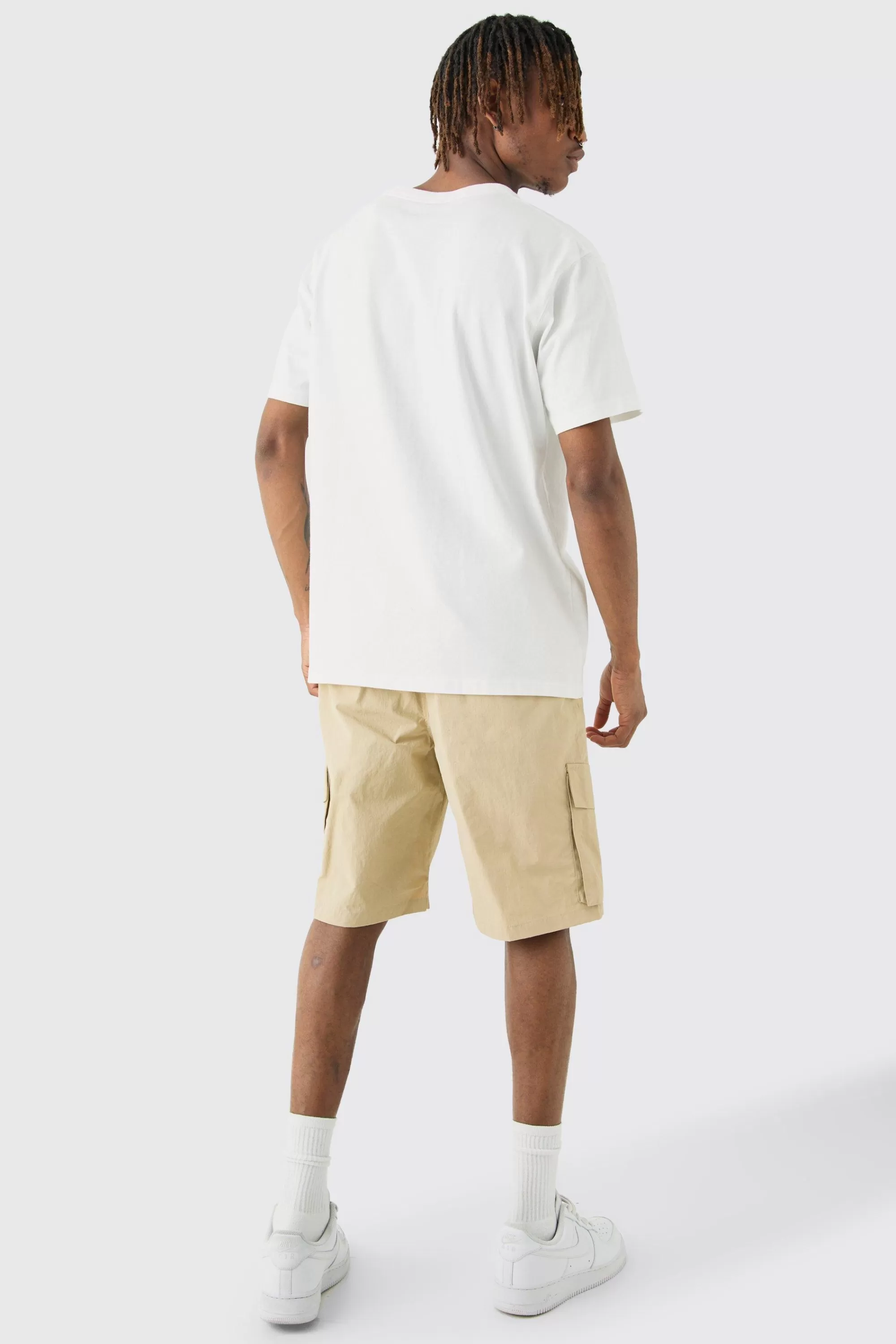 boohooMAN Tall Elasticated Waist Ofcl Nylon Cargo Short | UK