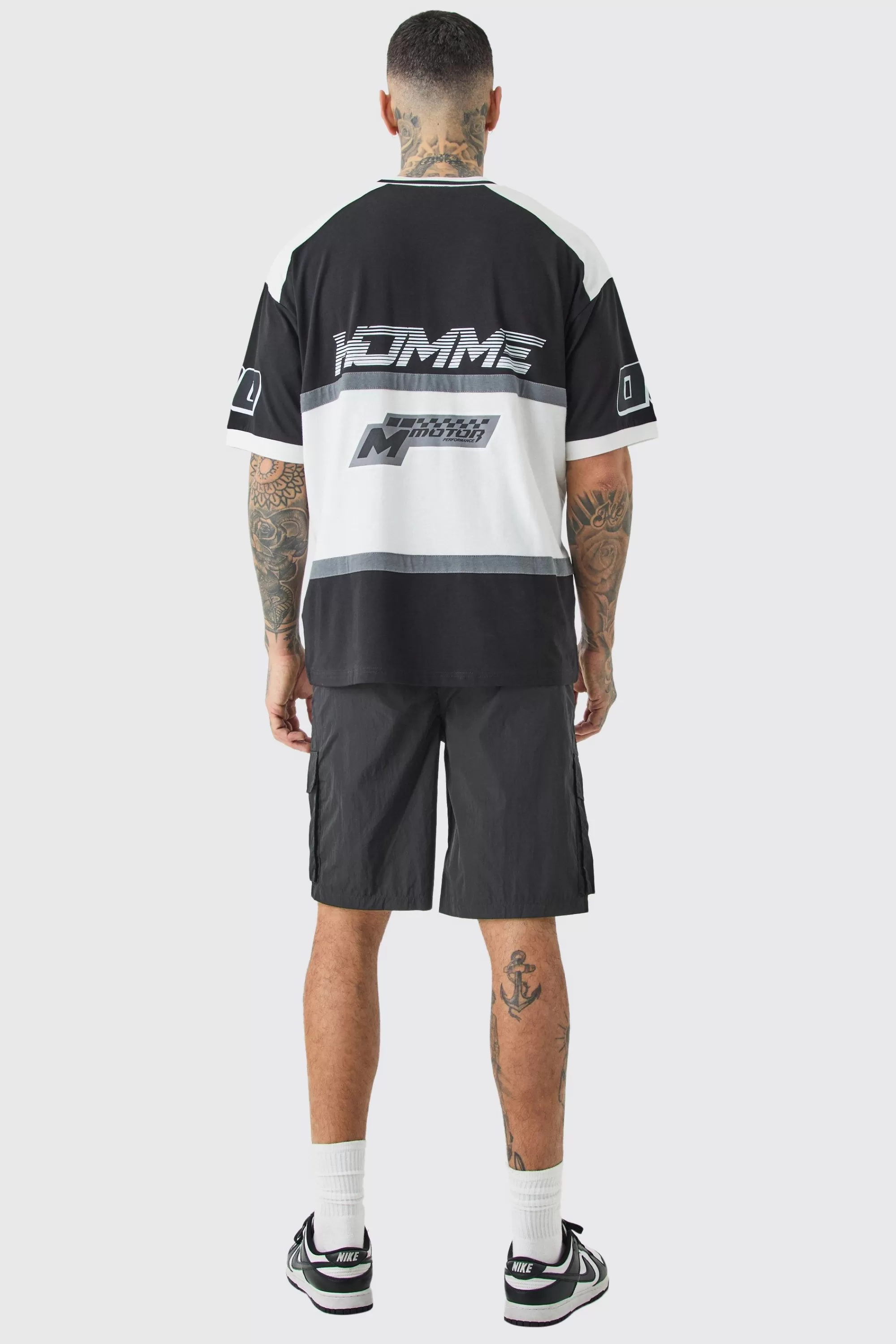 boohooMAN Tall Elasticated Waist Ofcl Nylon Cargo Short | UK