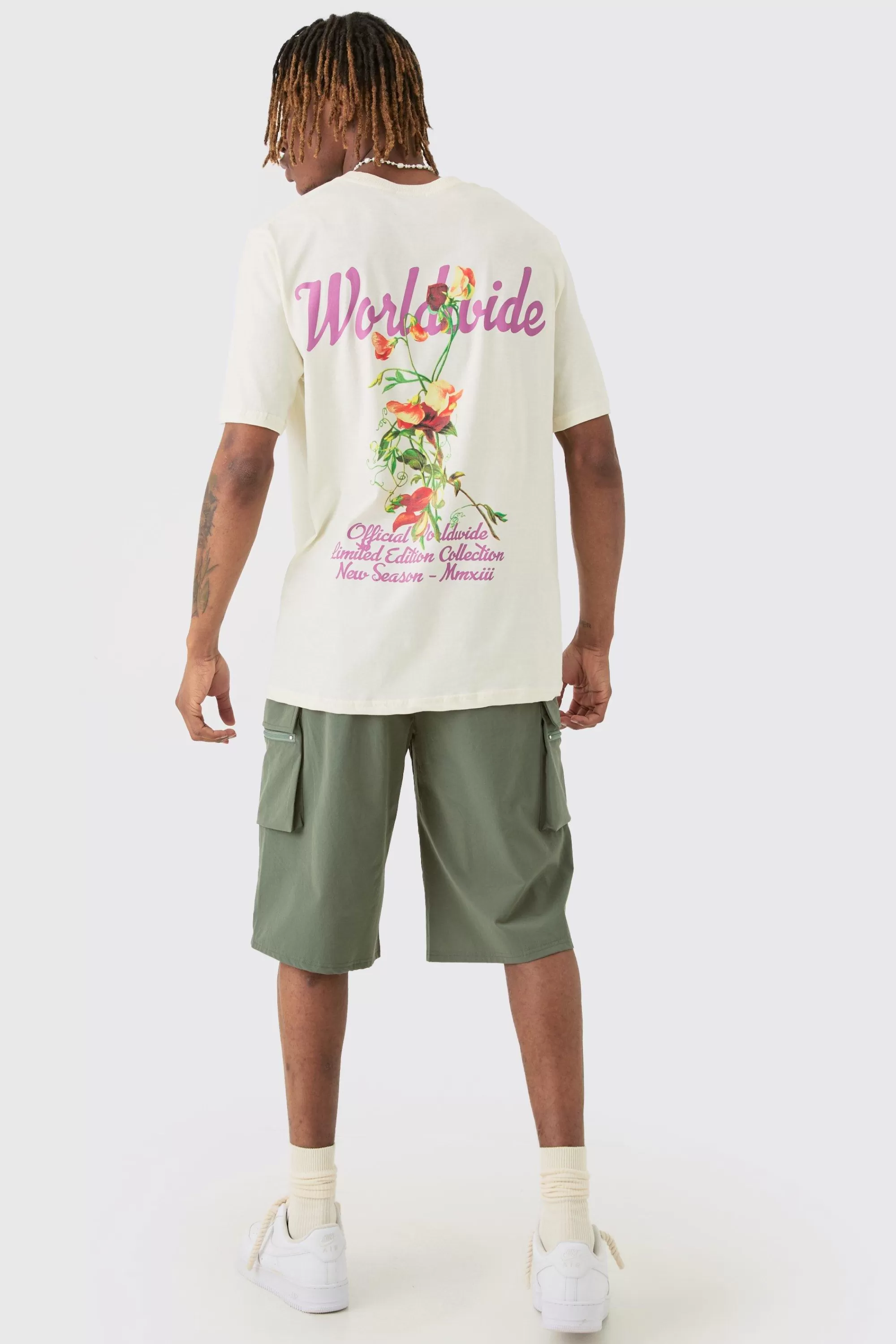 boohooMAN Tall Elasticated Waist Relaxed Lightweight Stretch Cargo Short | UK