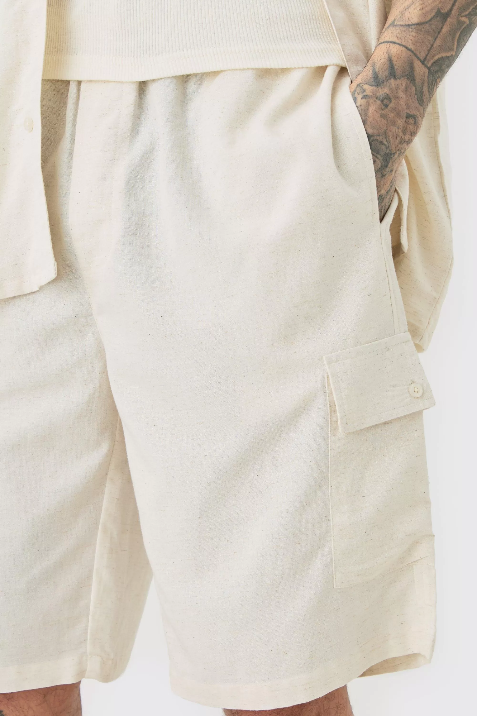 boohooMAN Tall Elasticated Waist Relaxed Linen Cargo Shorts In | UK