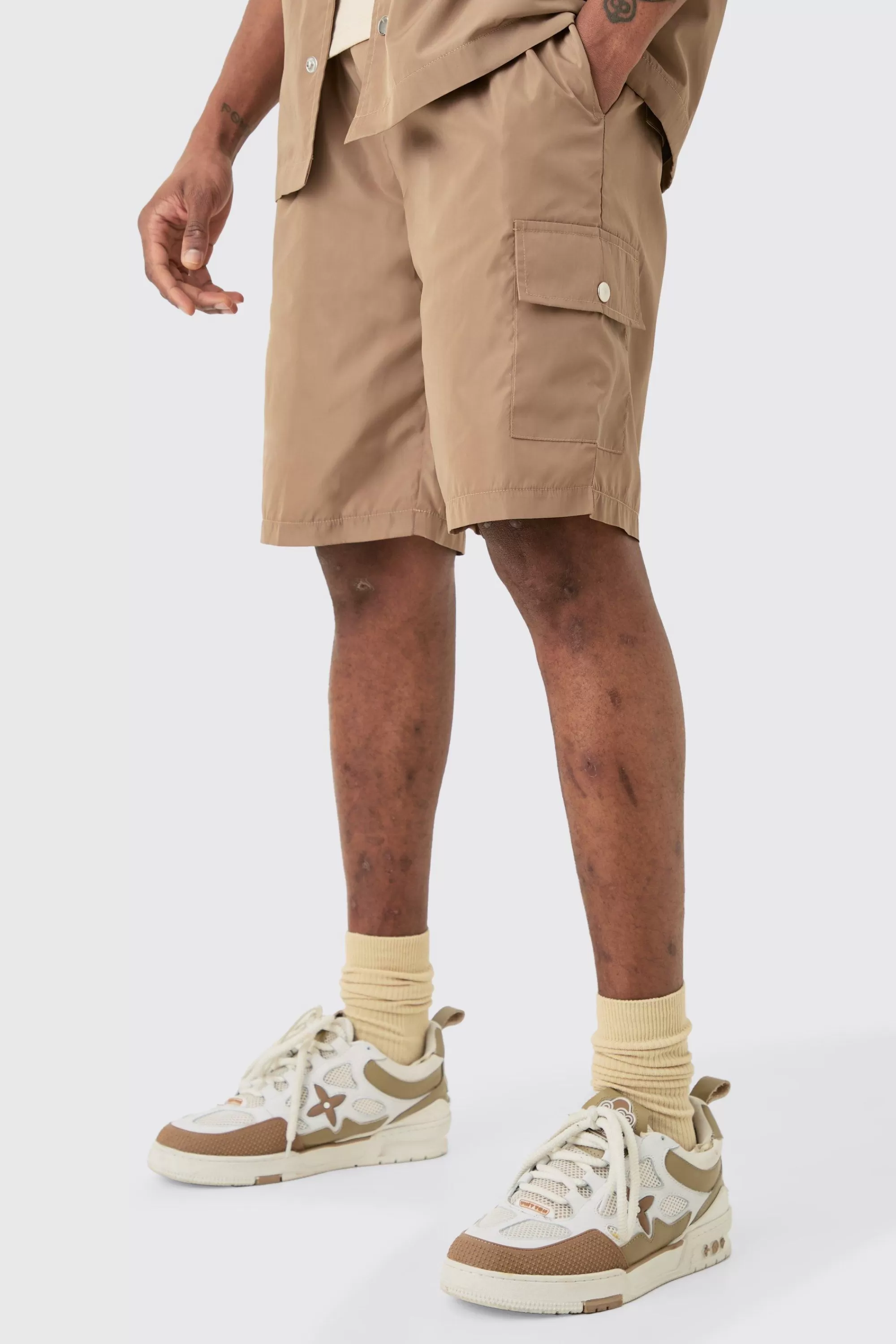boohooMAN Tall Elasticated Waist Relaxed Nylon Man Cargo Short | UK