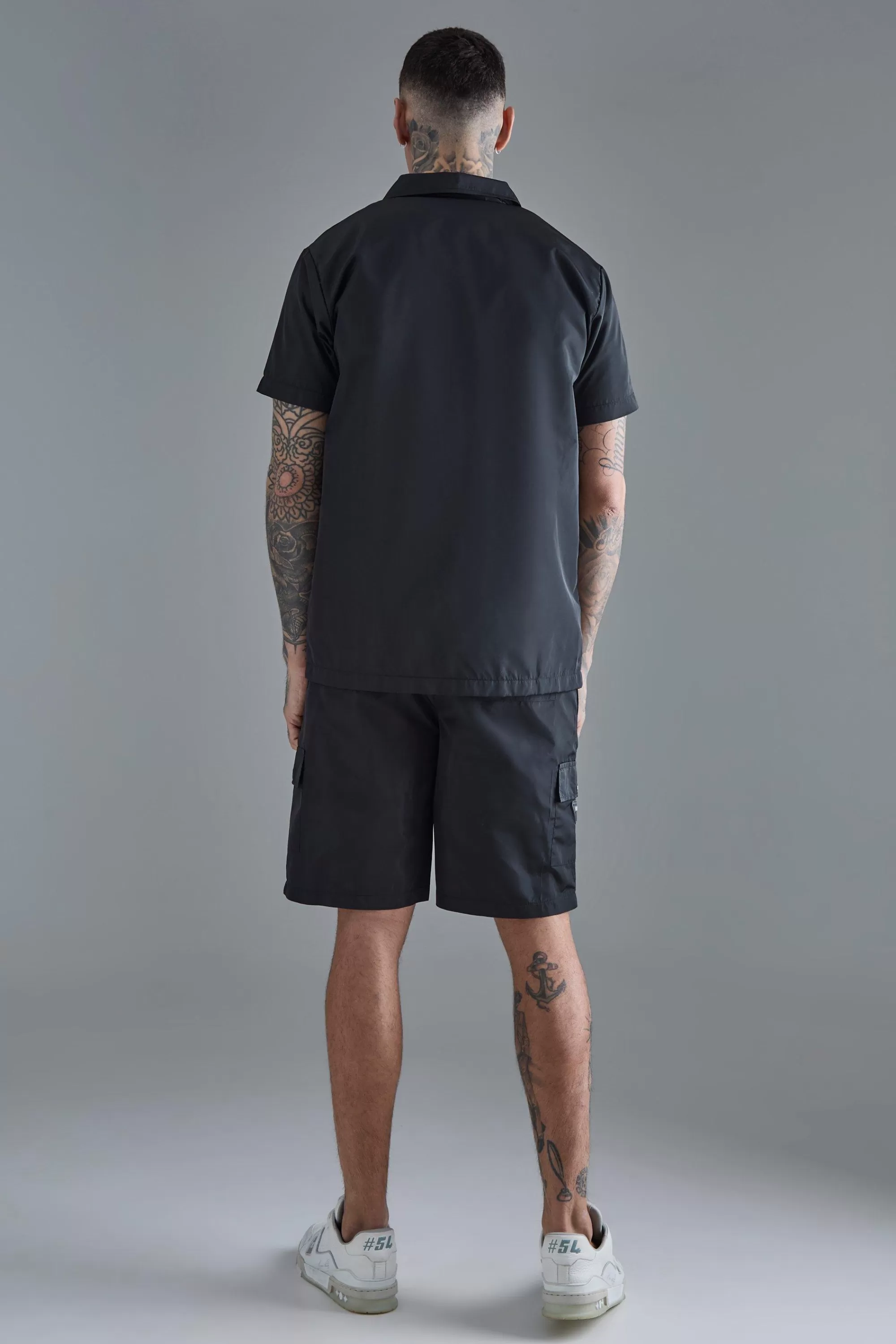 boohooMAN Tall Elasticated Waist Relaxed Nylon Man Cargo Short | UK