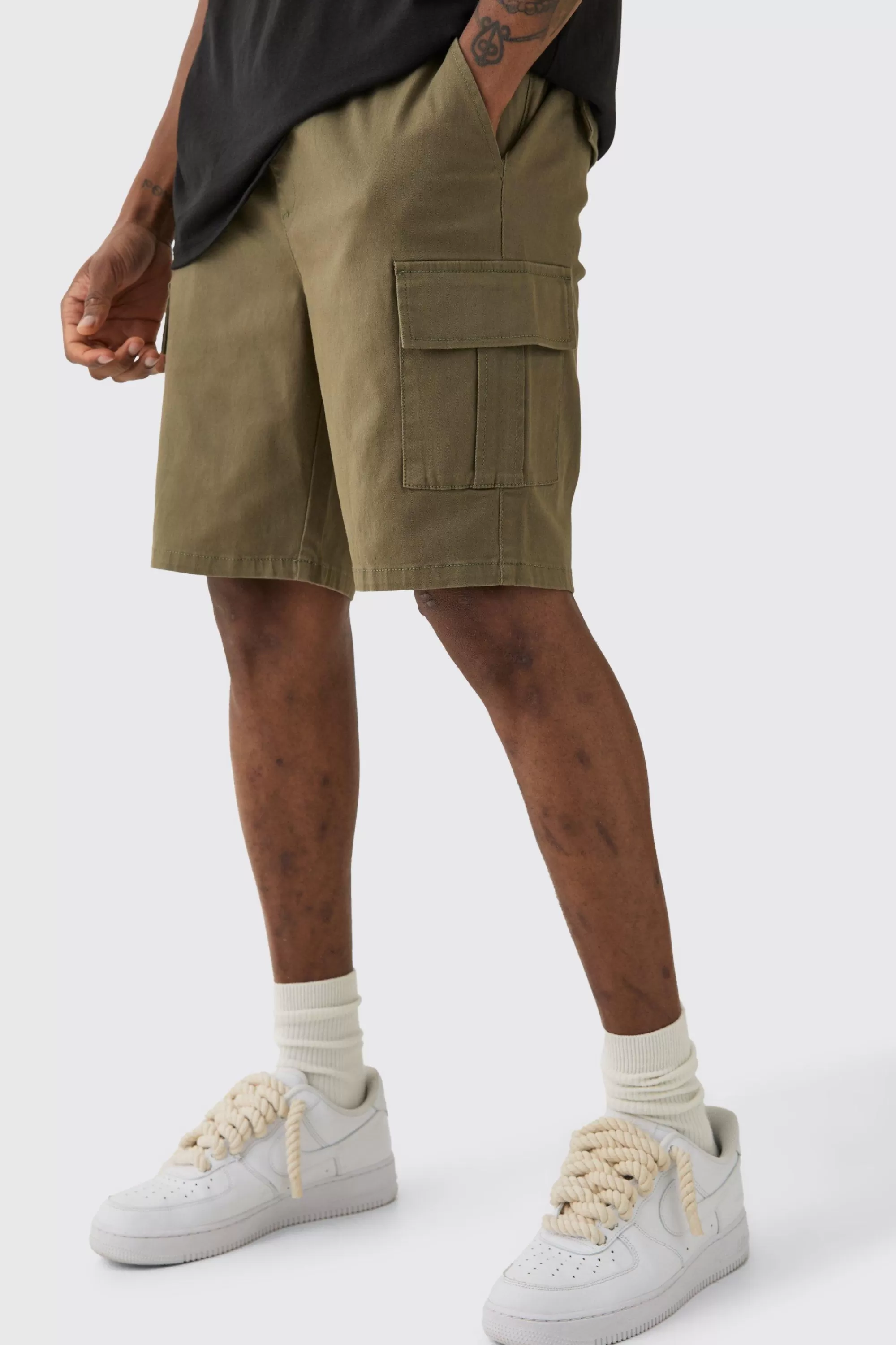 boohooMAN Tall Elasticated Waist Skinny Fit Cargo Shorts | UK