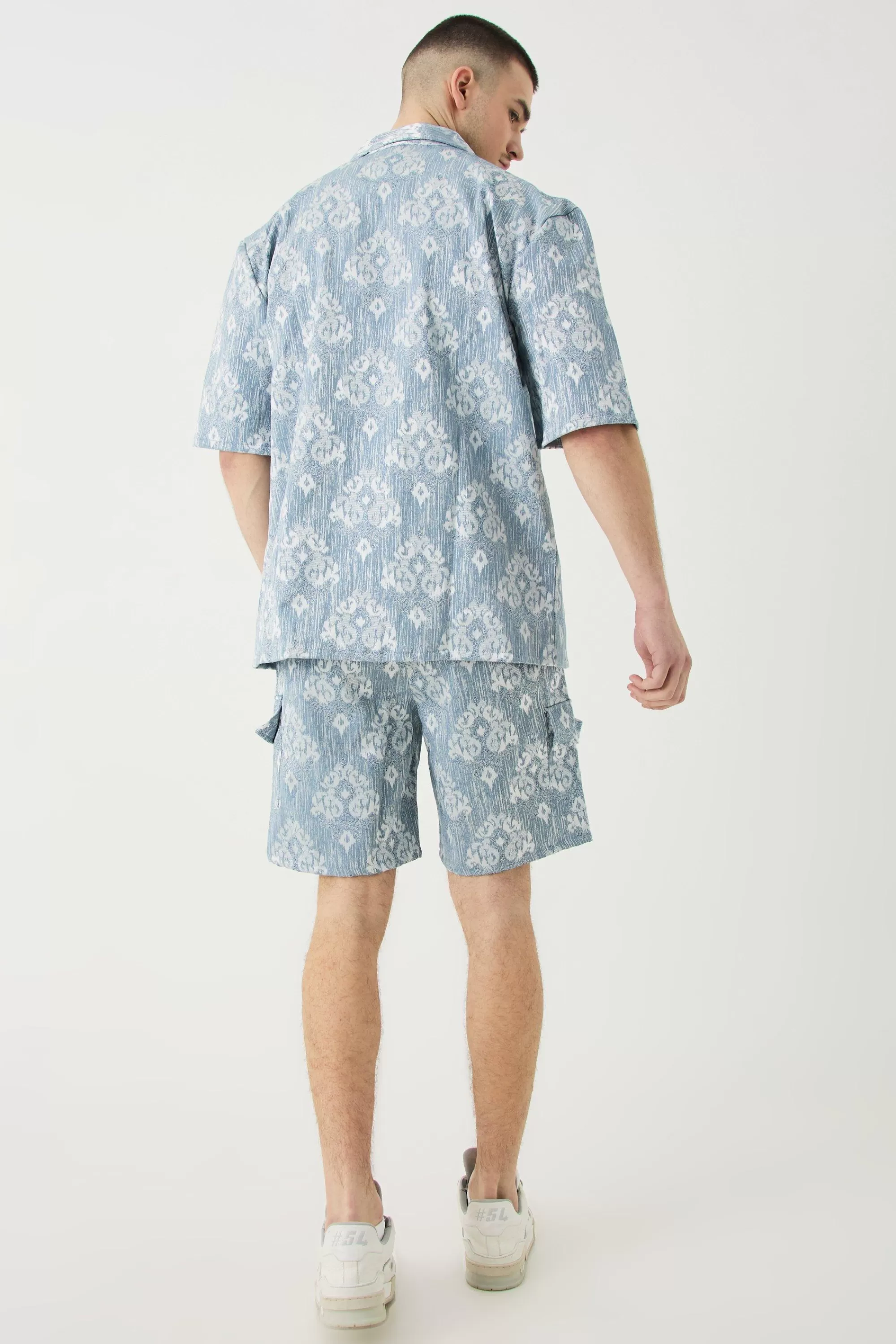 boohooMAN Tall Elasticated Waist Textured Cargo Short In | UK