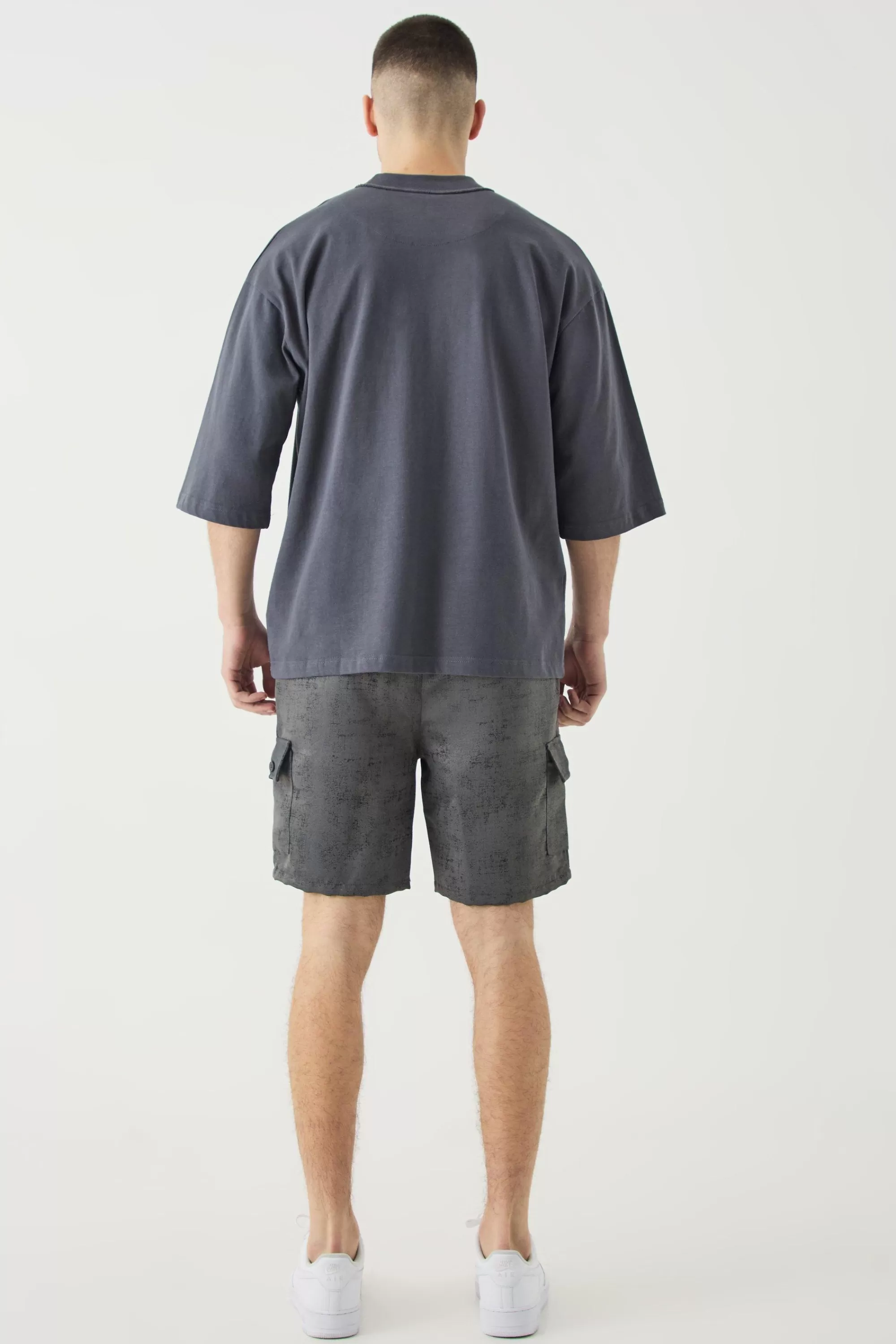 boohooMAN Tall Elasticated Waist Textured Cargo Short In | UK