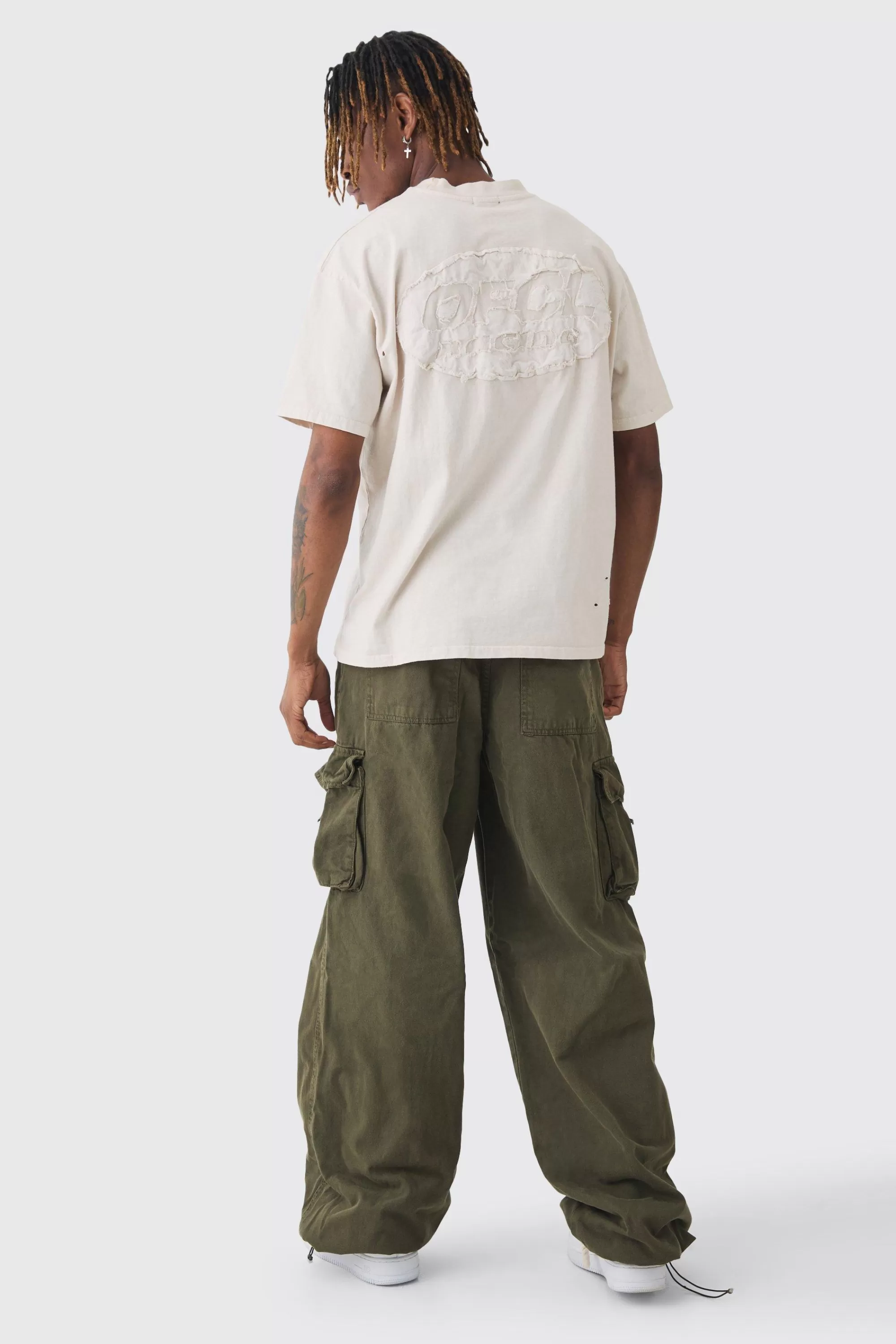 boohooMAN Tall Extreme Baggy Fit Toggle Cargo Trousers In | UK