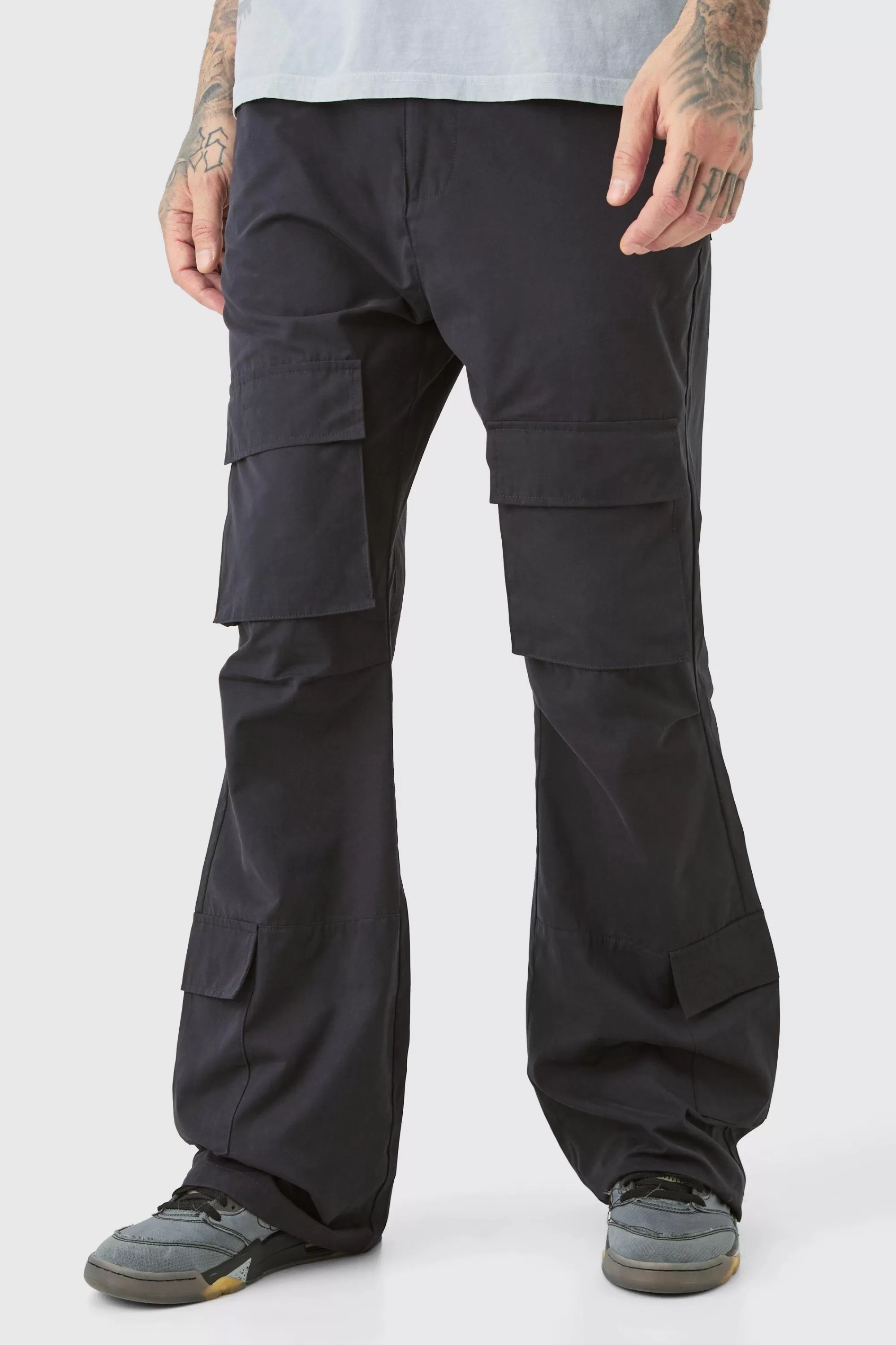 boohooMAN Tall Fixed Waist Relaxed Peached Flare Cargo Trouser | UK