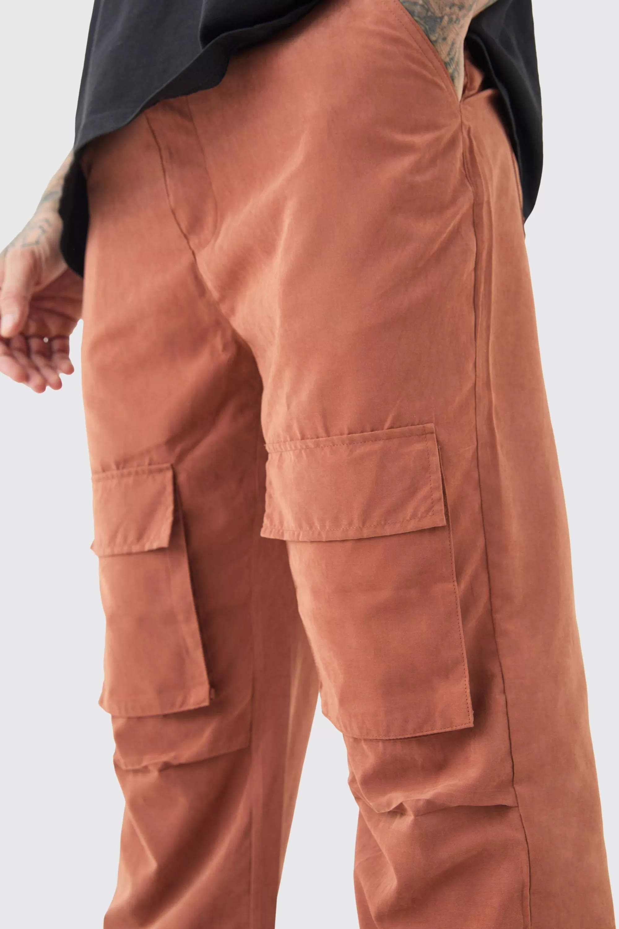 boohooMAN Tall Fixed Waist Relaxed Peached Flare Cargo Trouser | UK