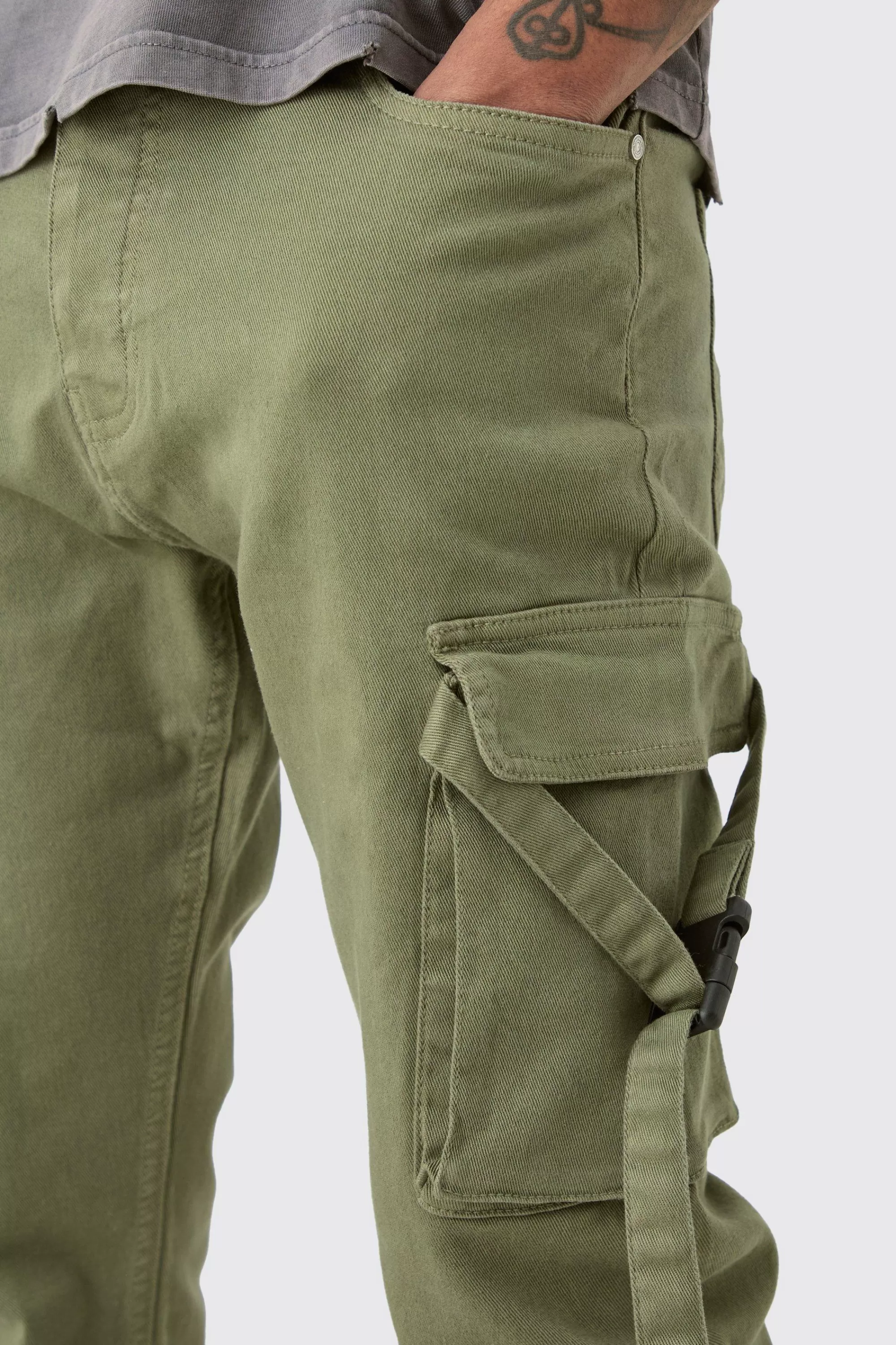 boohooMAN Tall Fixed Waist Slim Stacked Flare Strap Cargo Trouser | UK