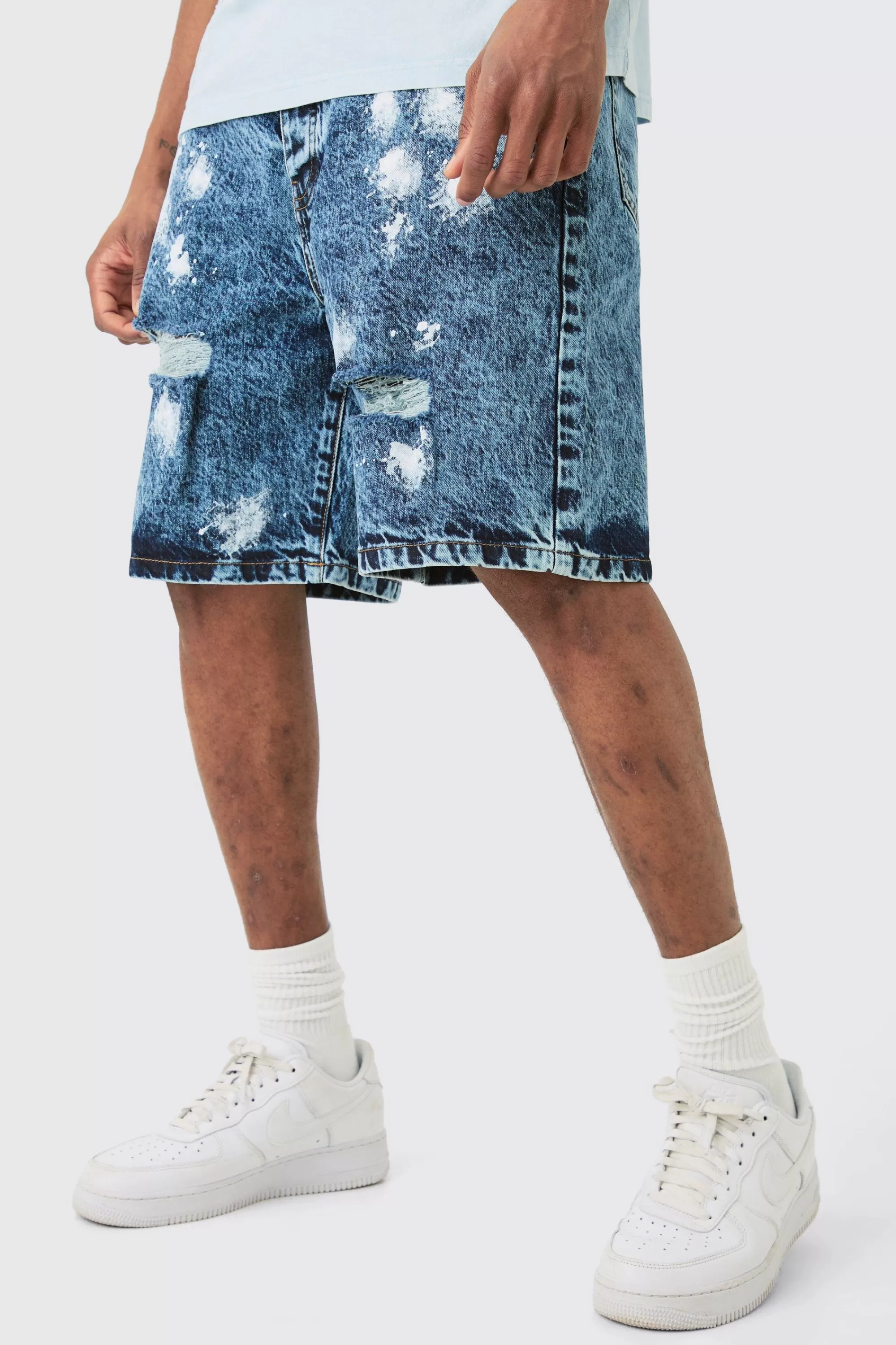 boohooMAN Tall Wash Paint Splatter Relaxed Denim Shorts | UK