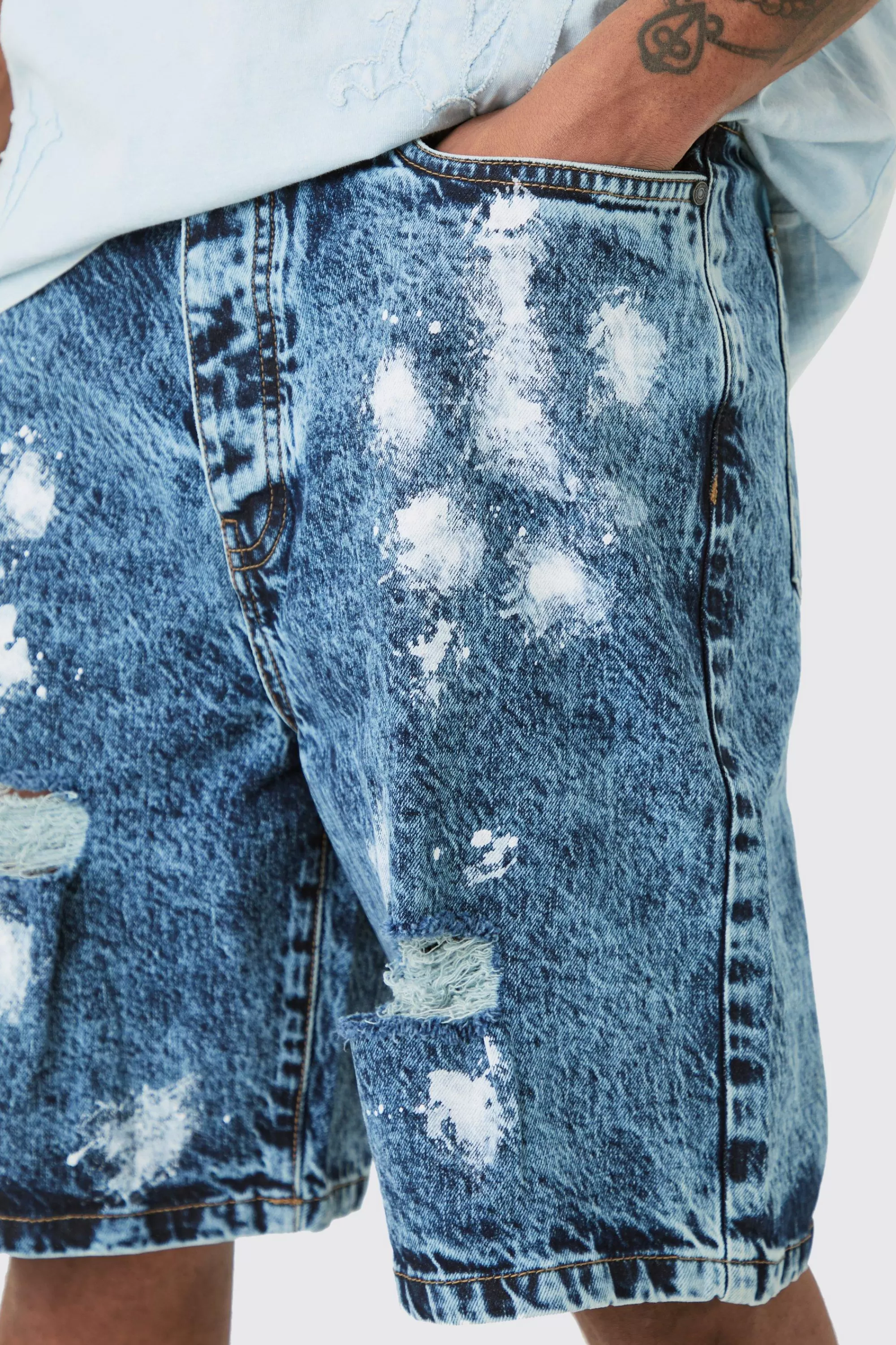 boohooMAN Tall Wash Paint Splatter Relaxed Denim Shorts | UK