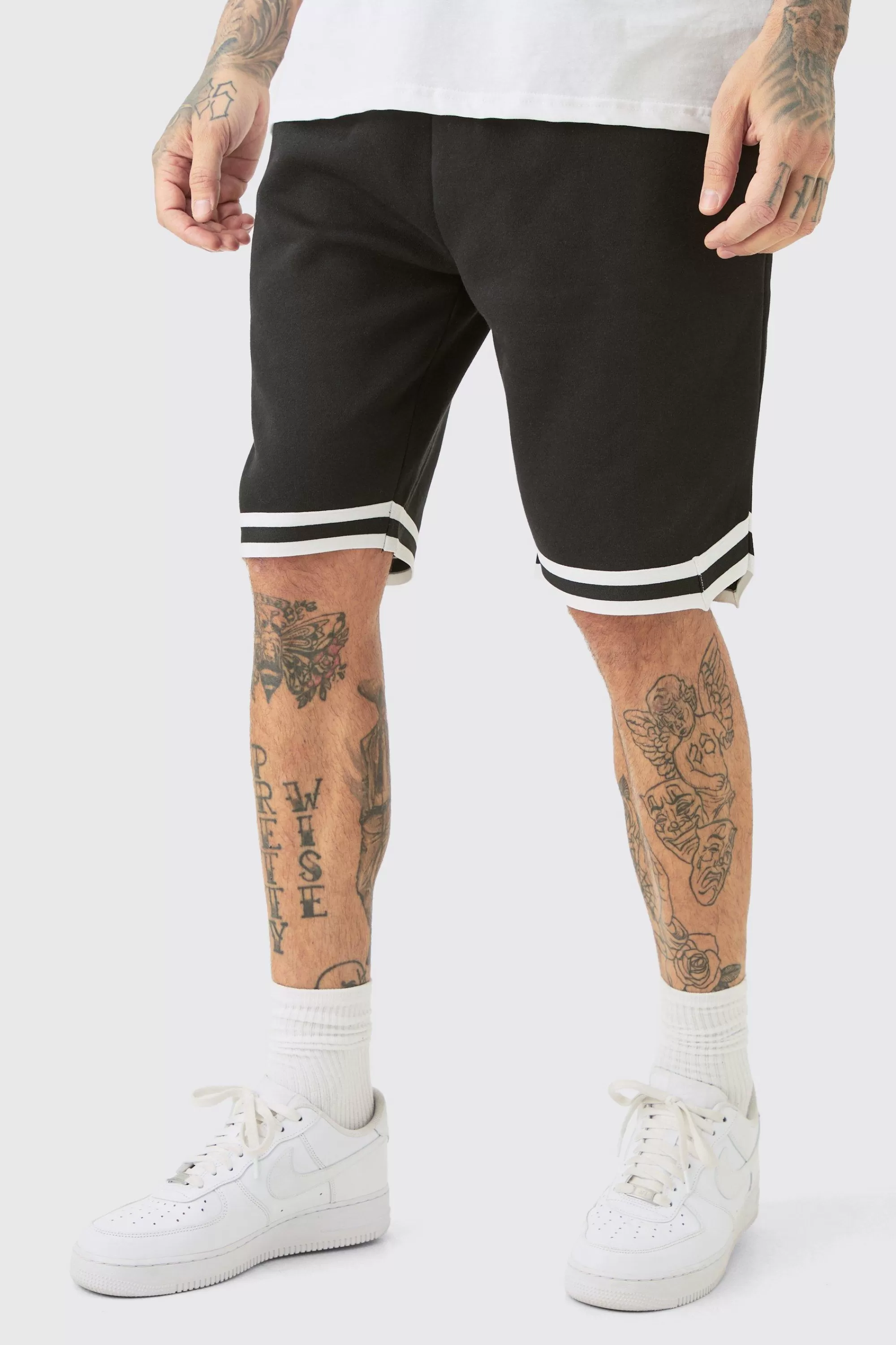 boohooMAN Tall Loose Fit Basketball Short In | UK