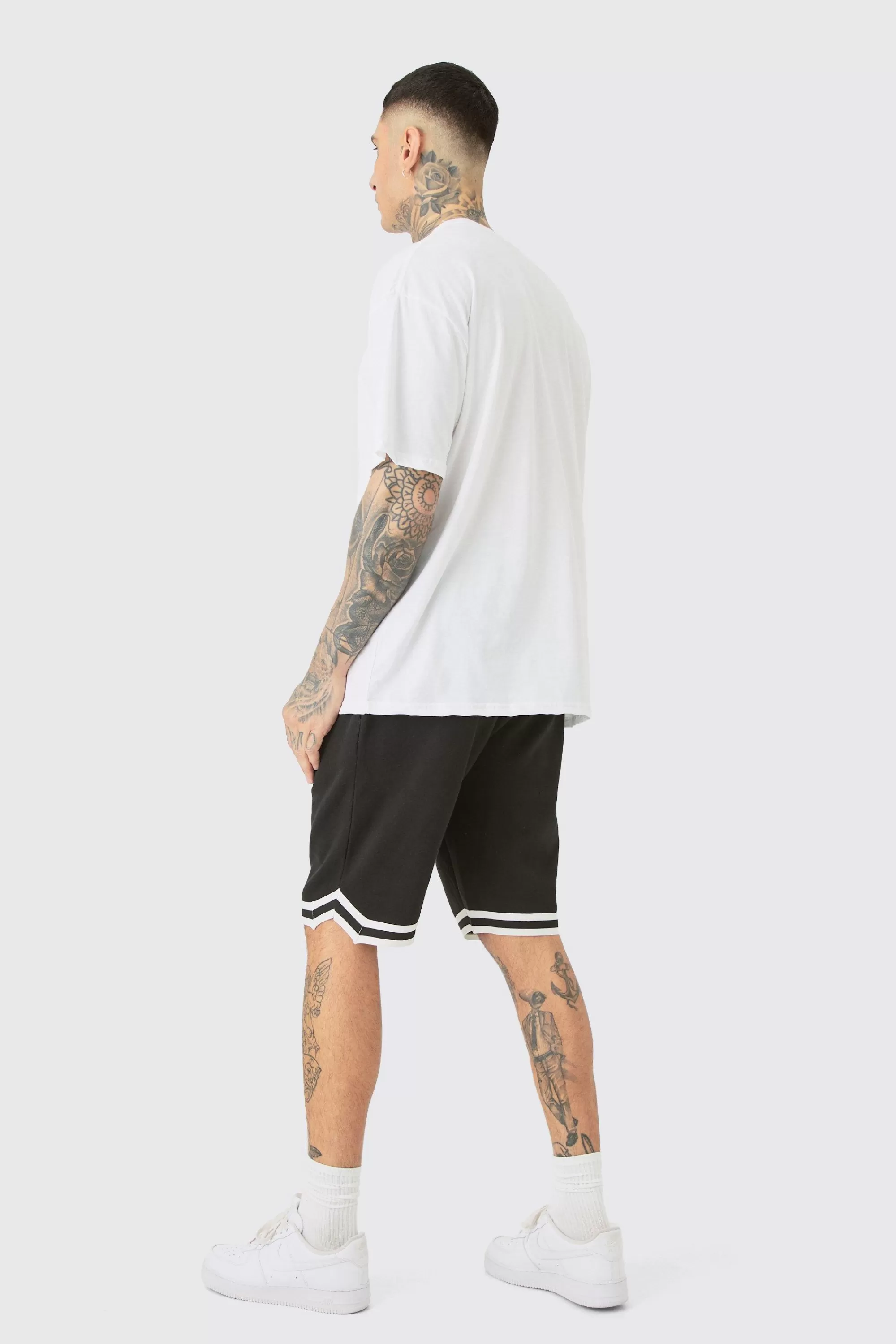 boohooMAN Tall Loose Fit Basketball Short In | UK