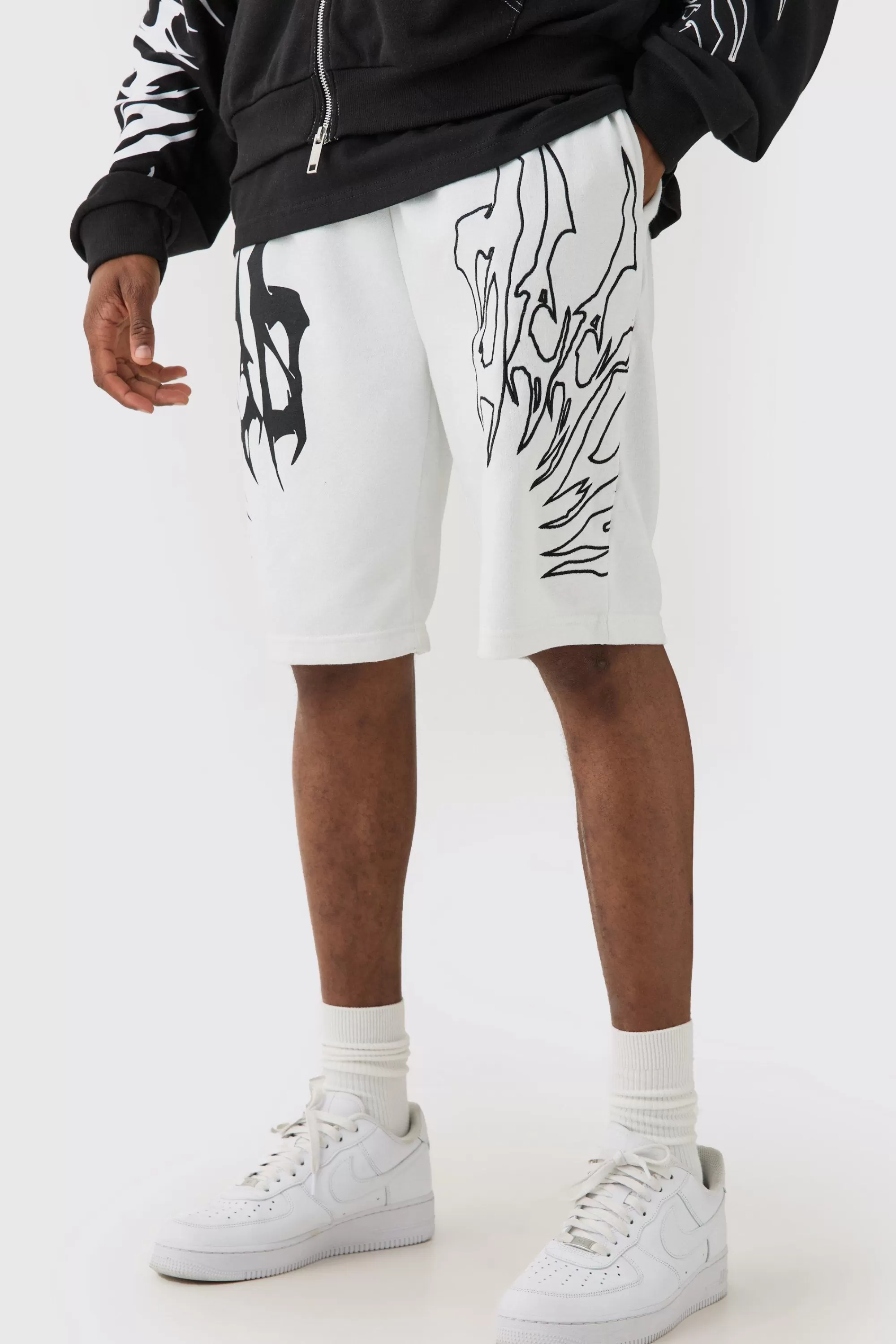 boohooMAN Tall Loose Fit Embroidery Shorts | UK