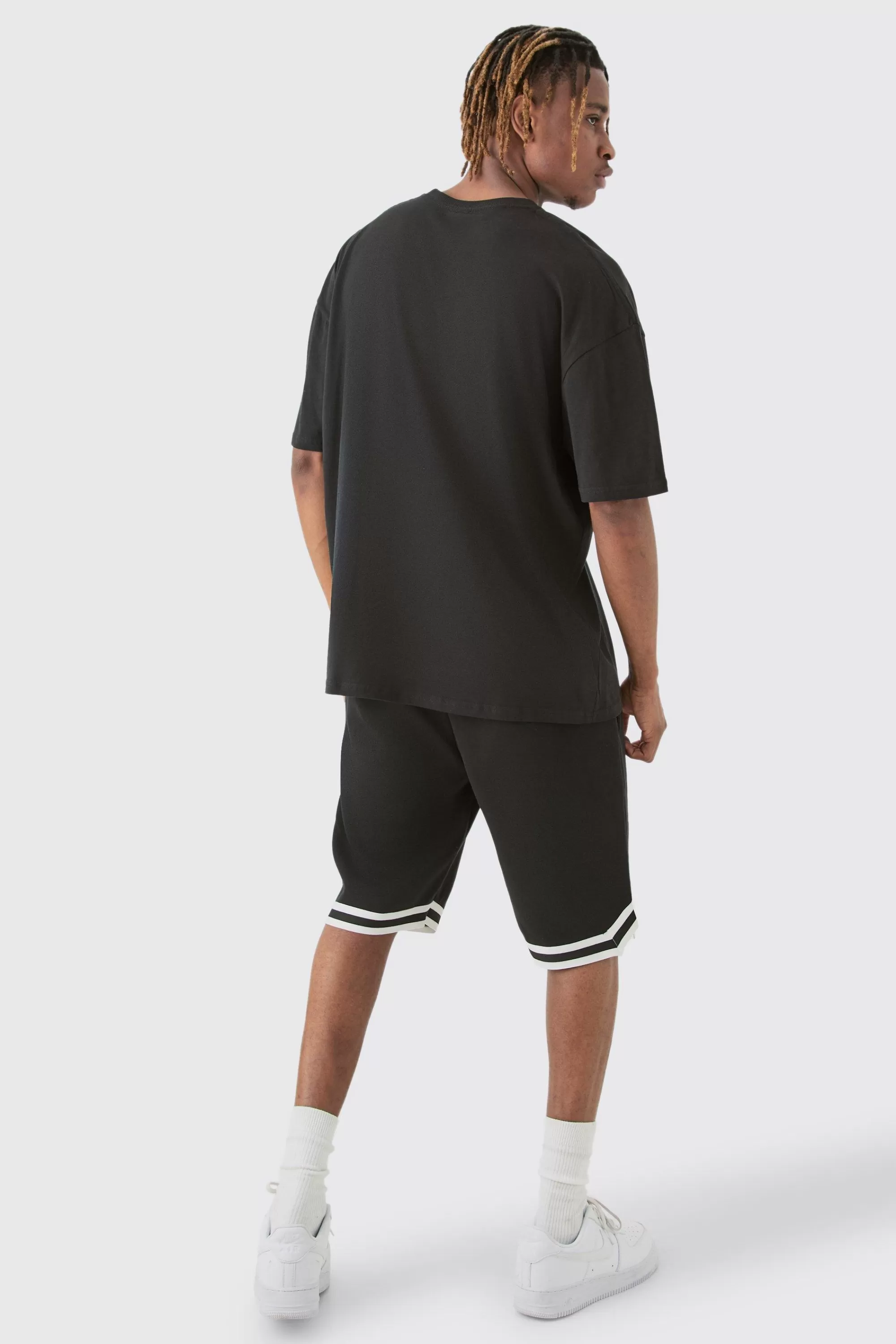 boohooMAN Tall Loose Fit Limited Edition Basketball Short In | UK