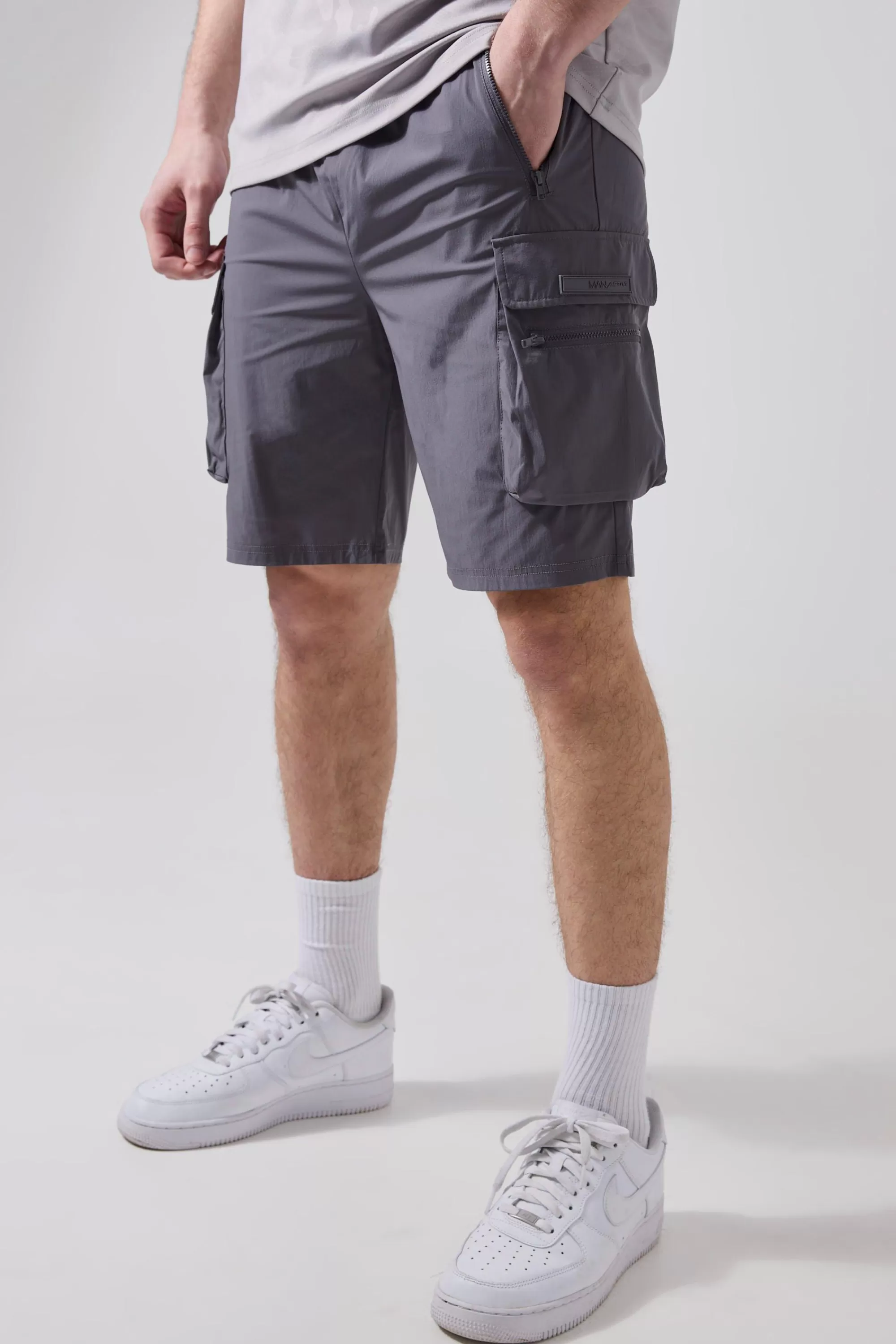 boohooMAN Tall Man Active Lightweight Regular Fit 5inch Cargo Shorts | UK