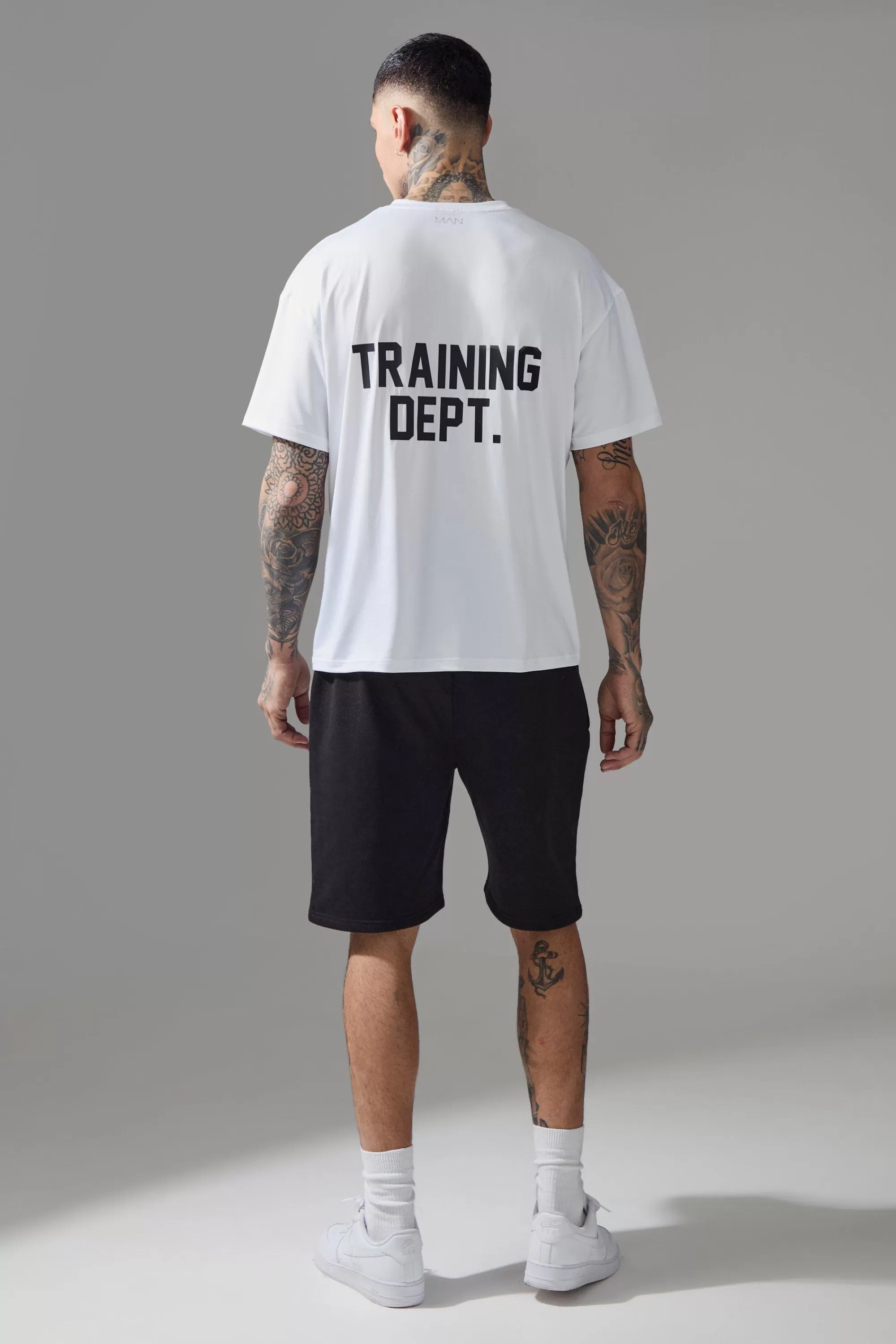 boohooMAN Tall Man Active Training Dept. Oversized 9inch Short | UK
