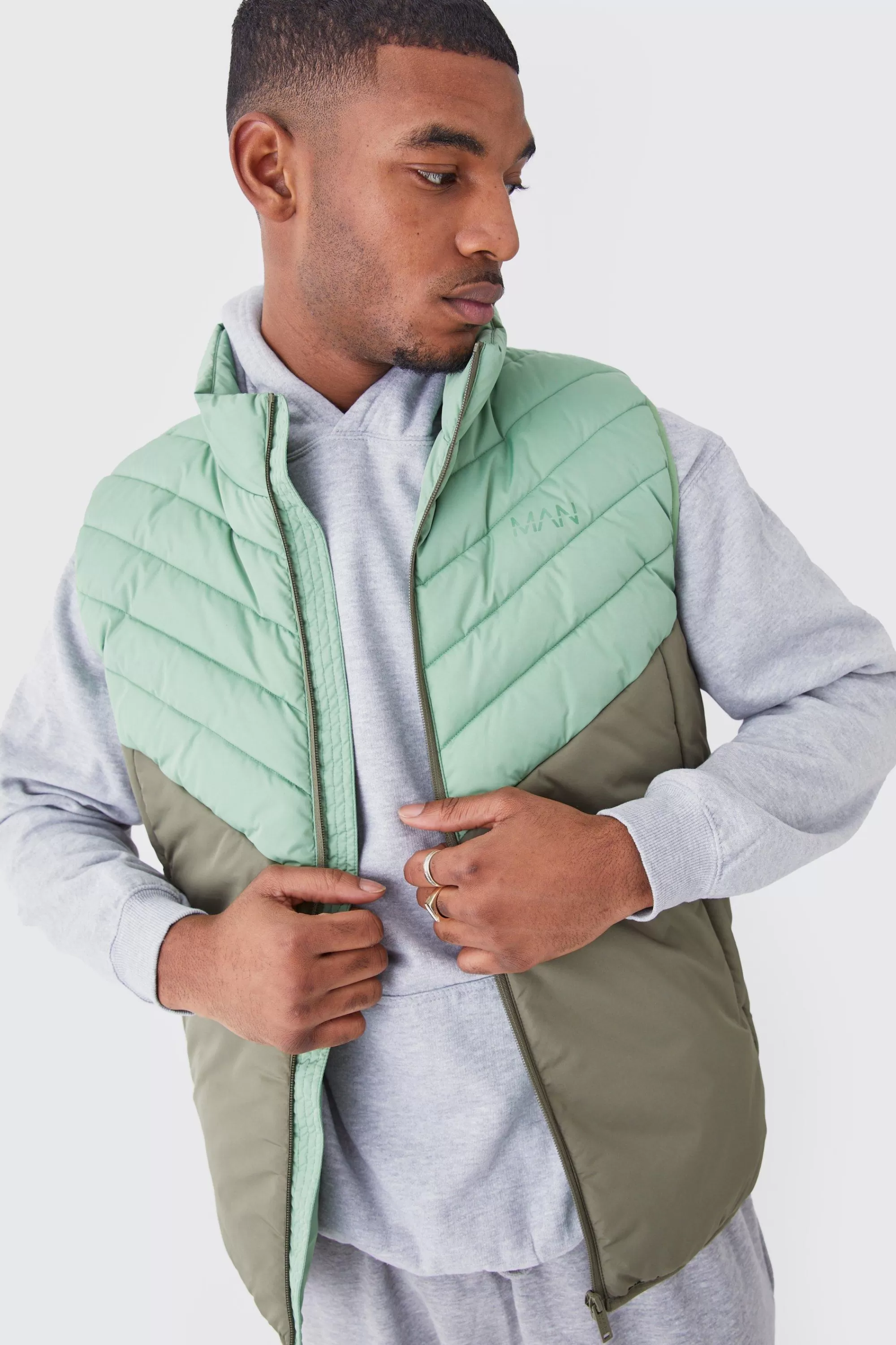 boohooMAN Tall Man Colour Block Quilted Funnel Neck Gilet | UK