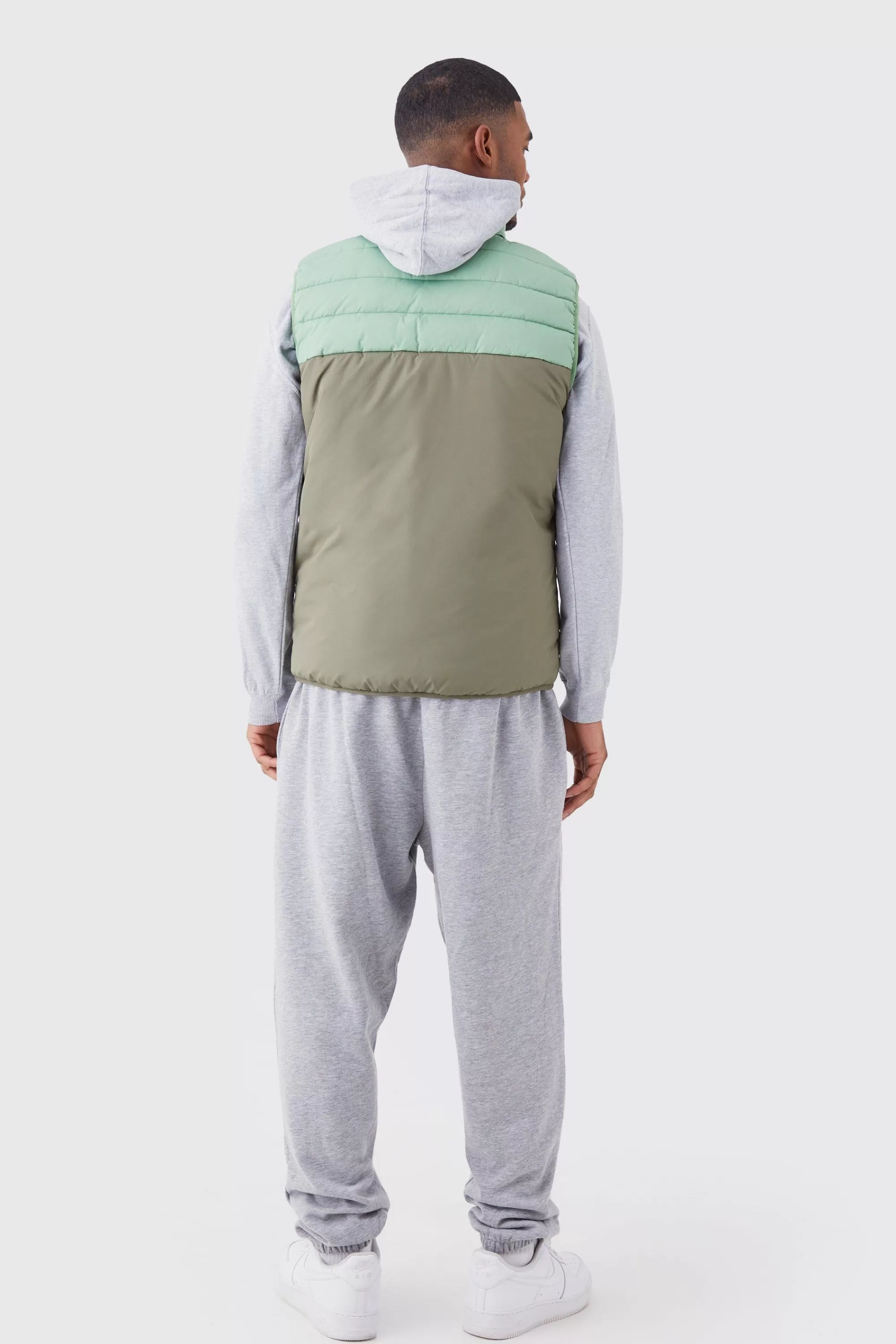 boohooMAN Tall Man Colour Block Quilted Funnel Neck Gilet | UK