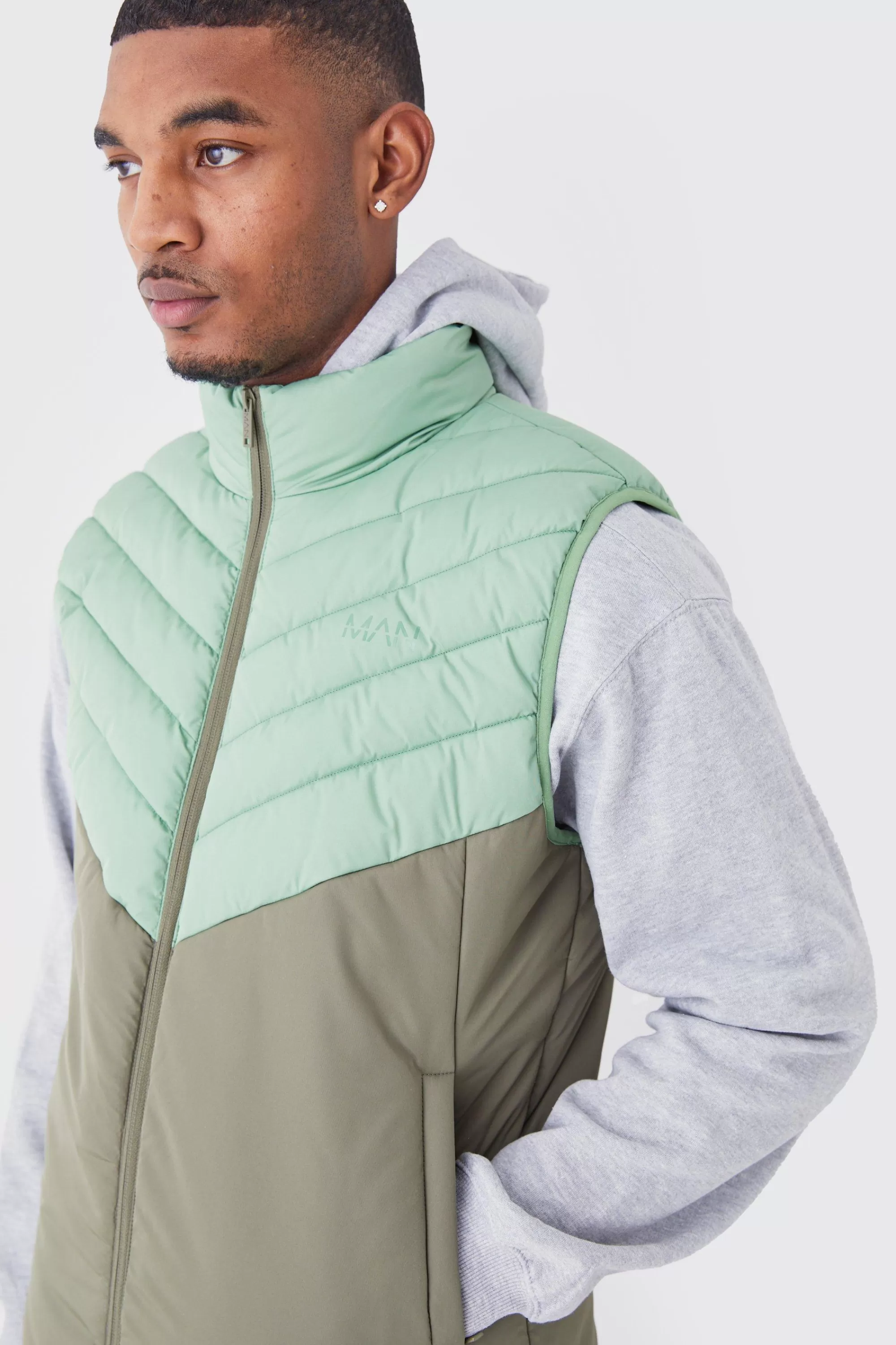 boohooMAN Tall Man Colour Block Quilted Funnel Neck Gilet | UK