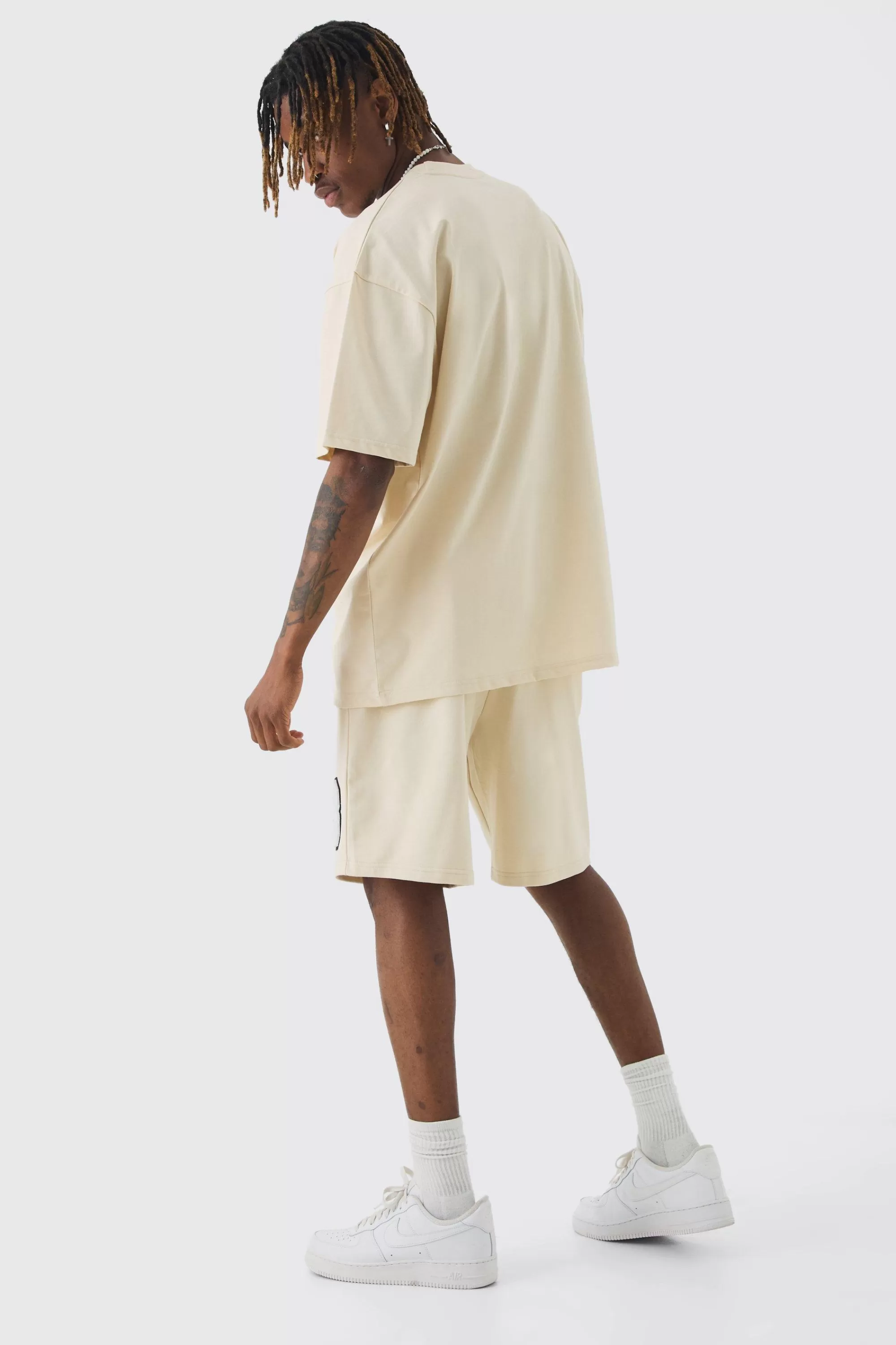 boohooMAN Tall Oversized Applique T-shirt & Short Set | UK