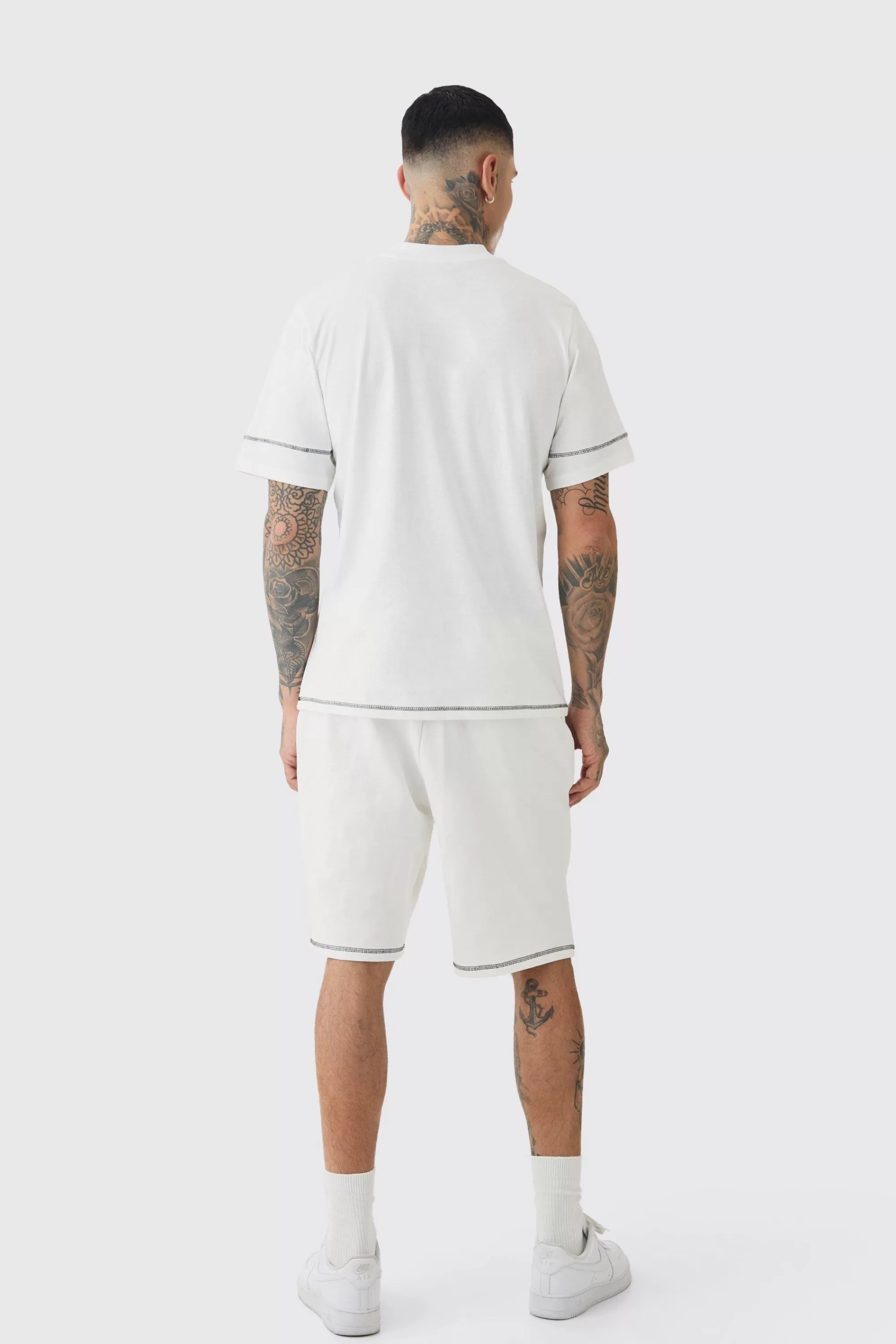 boohooMAN Tall Oversized Extended Contrast Stitch T-shirt & Short Set | UK