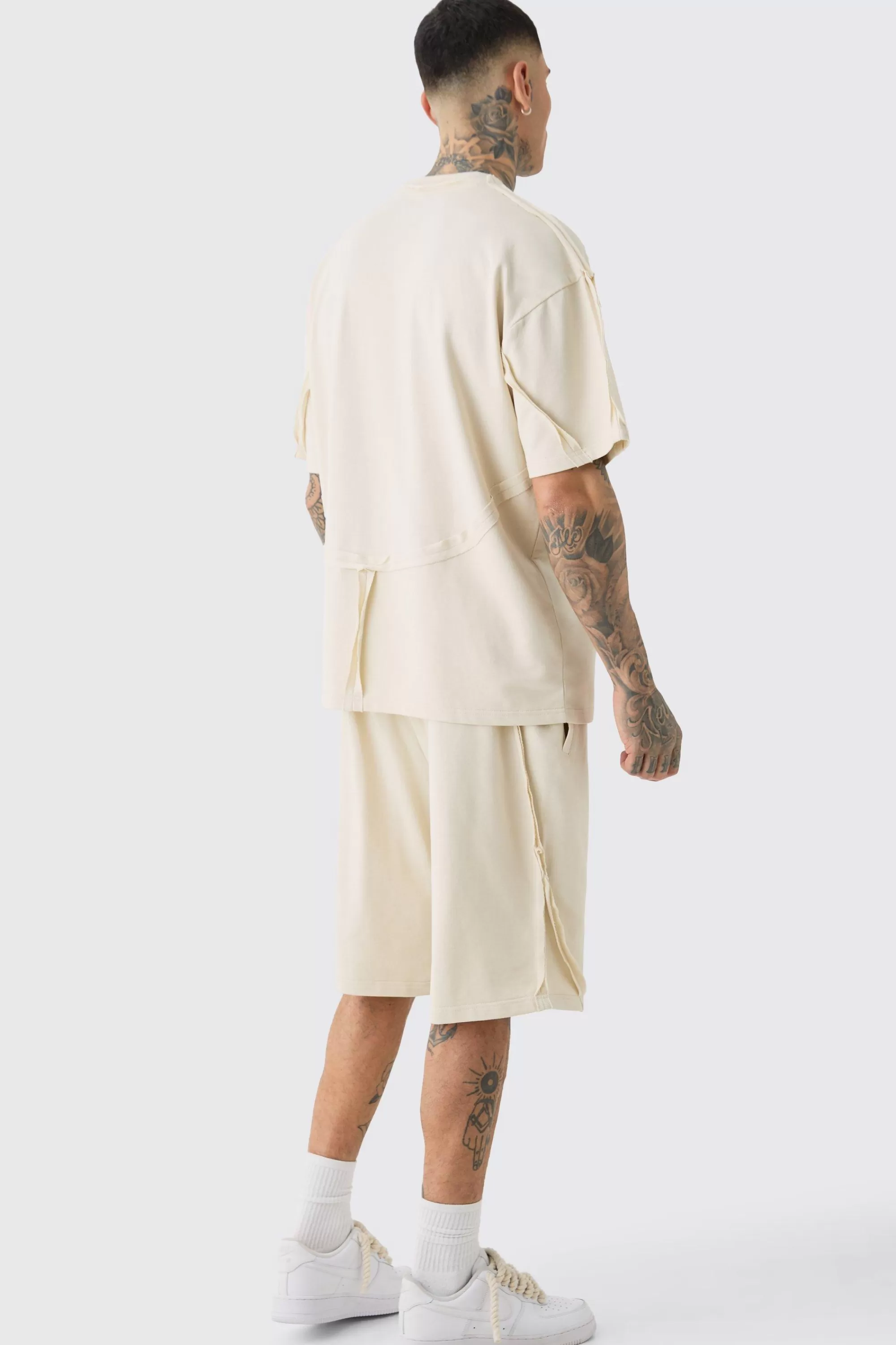 boohooMAN Tall Oversized Extended Neck Distressed Seam T-shirt & Short Set | UK
