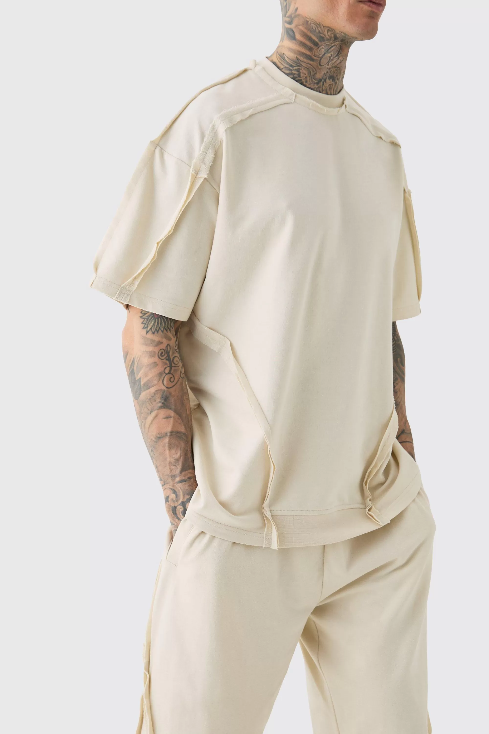boohooMAN Tall Oversized Extended Neck Distressed Seam T-shirt & Short Set | UK