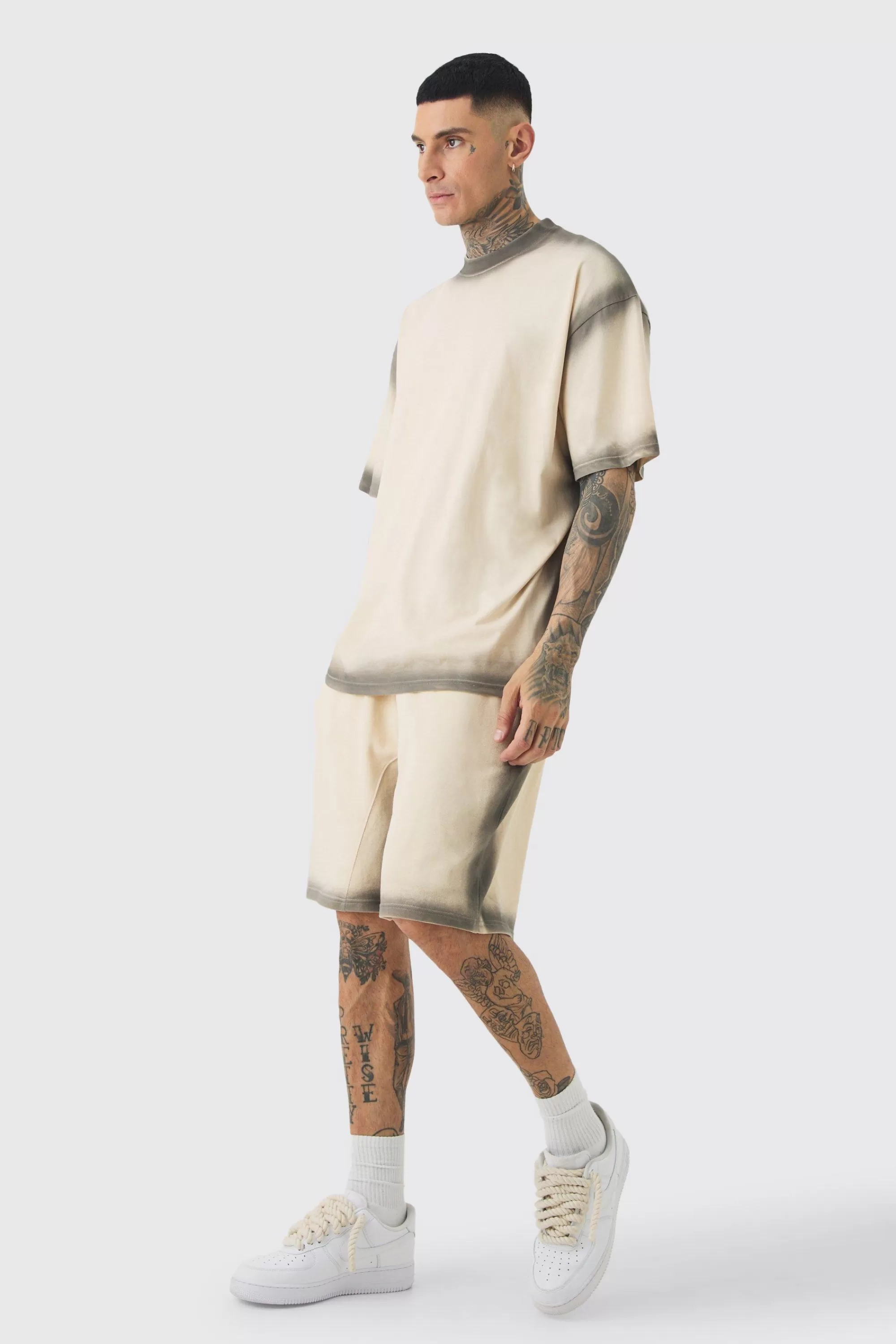 boohooMAN Tall Oversized Extended Neck Spray Wash T-shirt & Short Set | UK