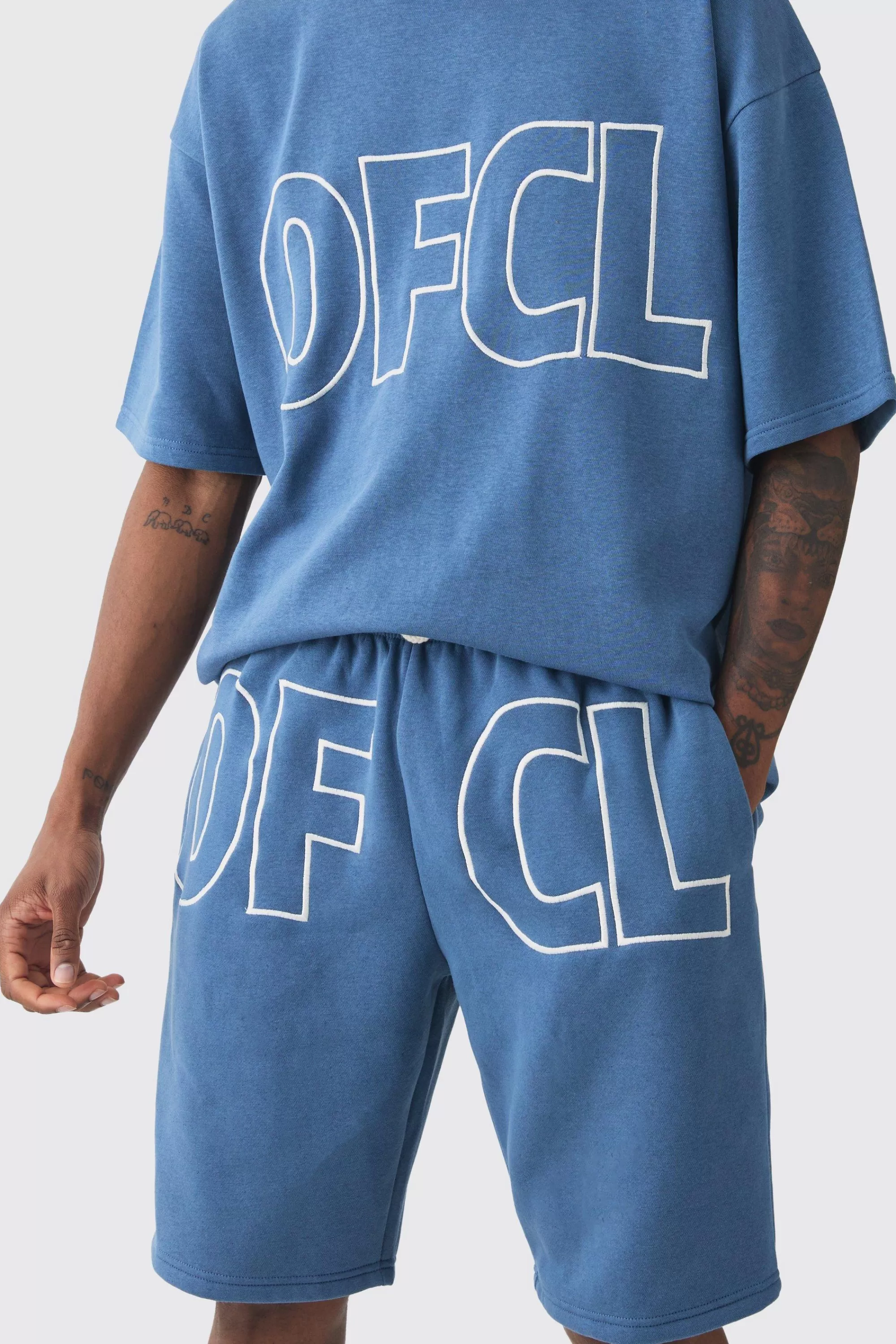 boohooMAN Tall Oversized Ofcl Applique T-shirt & Short Set | UK
