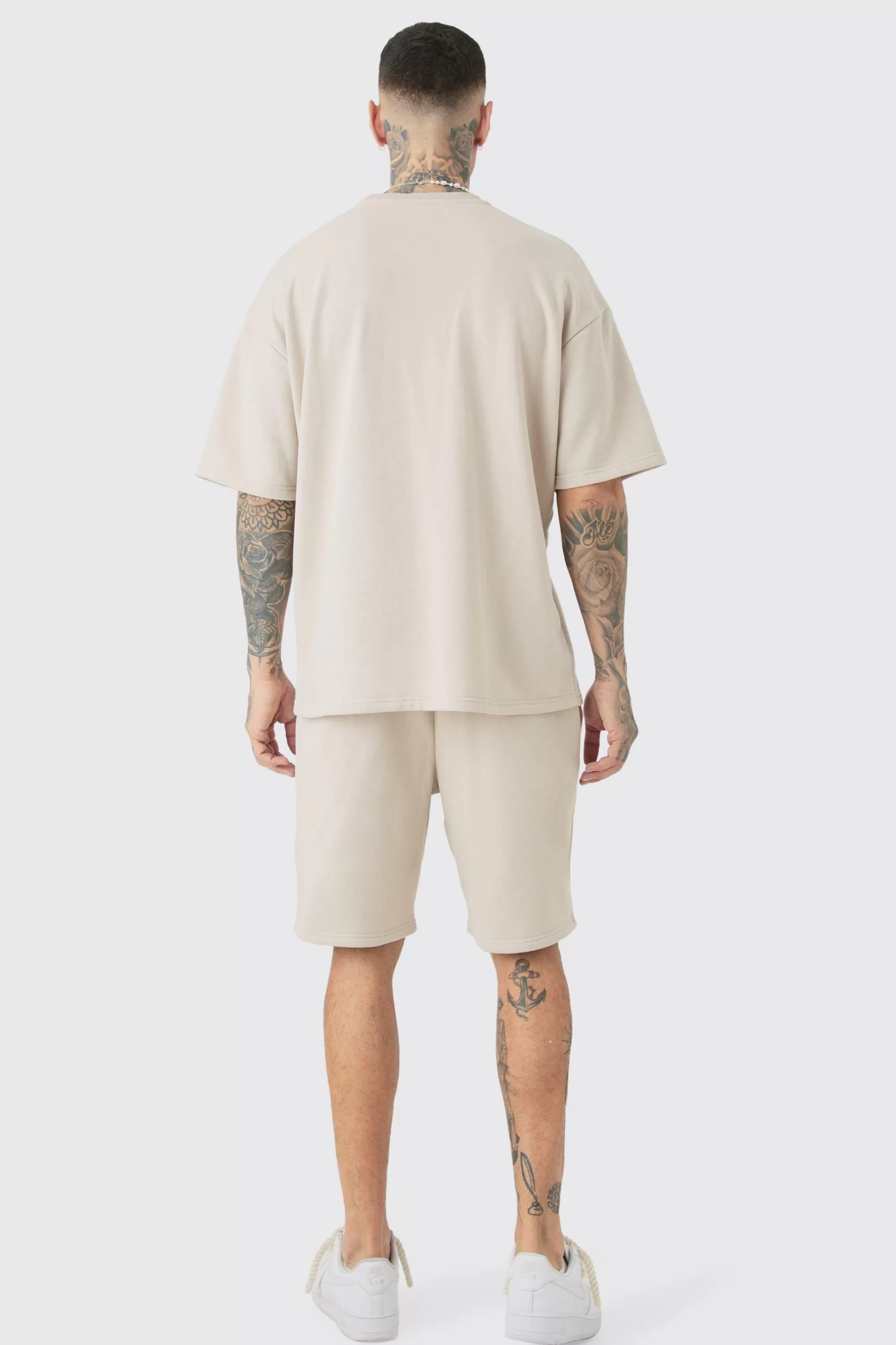 boohooMAN Tall Oversized OFCL Embroidered T-Shirt & Short Set | UK